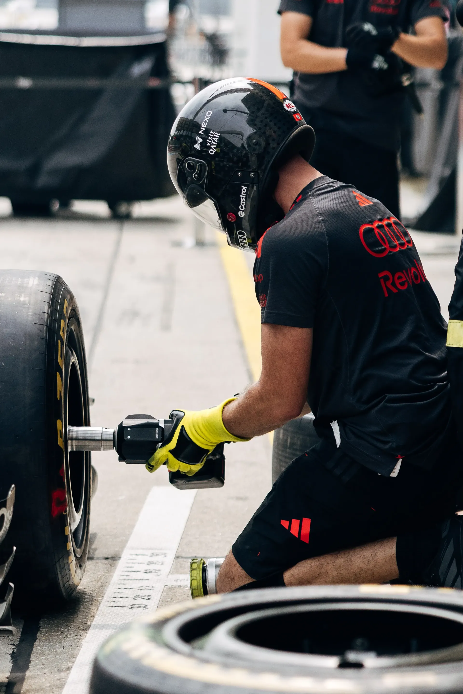 Audi Revolut F1® Team mechanic preparing a wheel