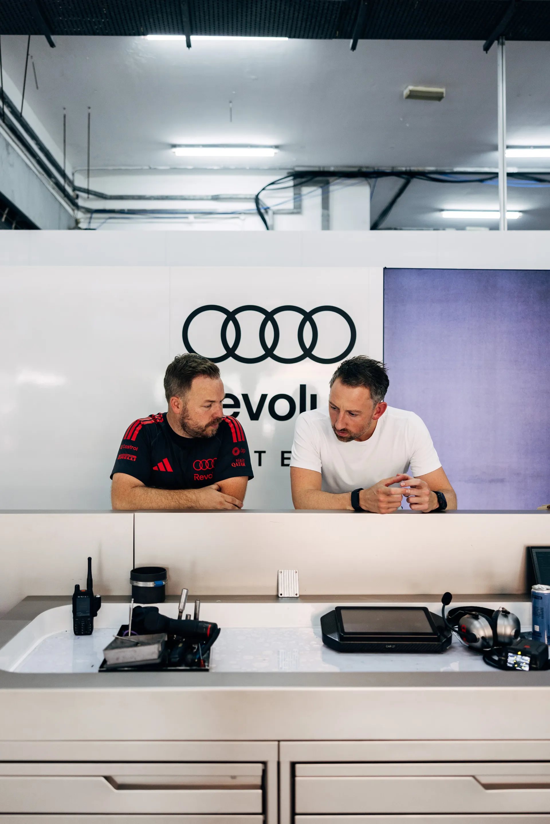 Audi Revolut F1® Team team members working in the garage