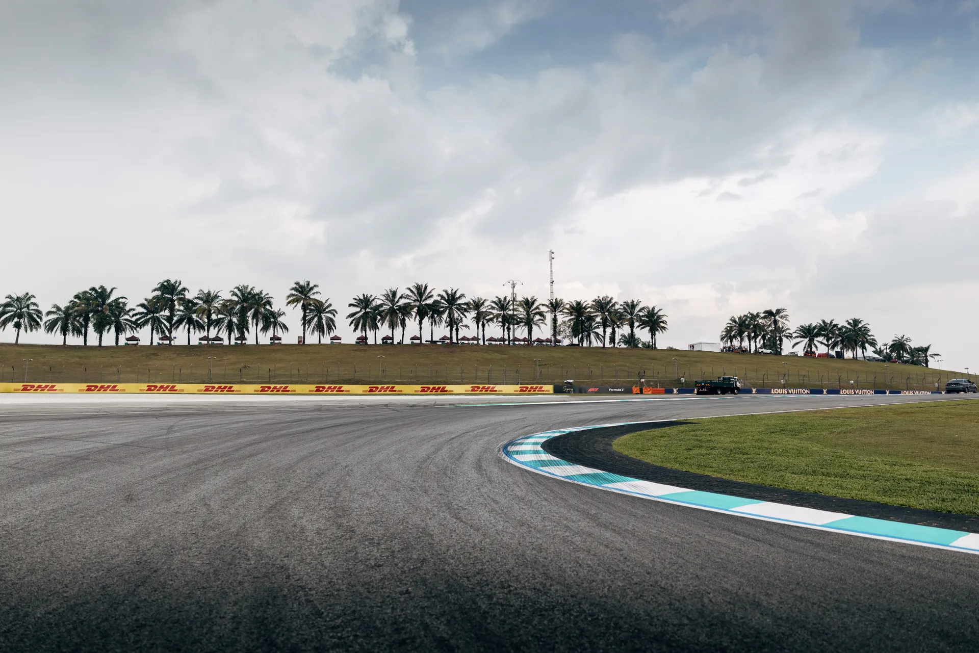 Curving section of Bahrain International Circuit with blue and white kerbs