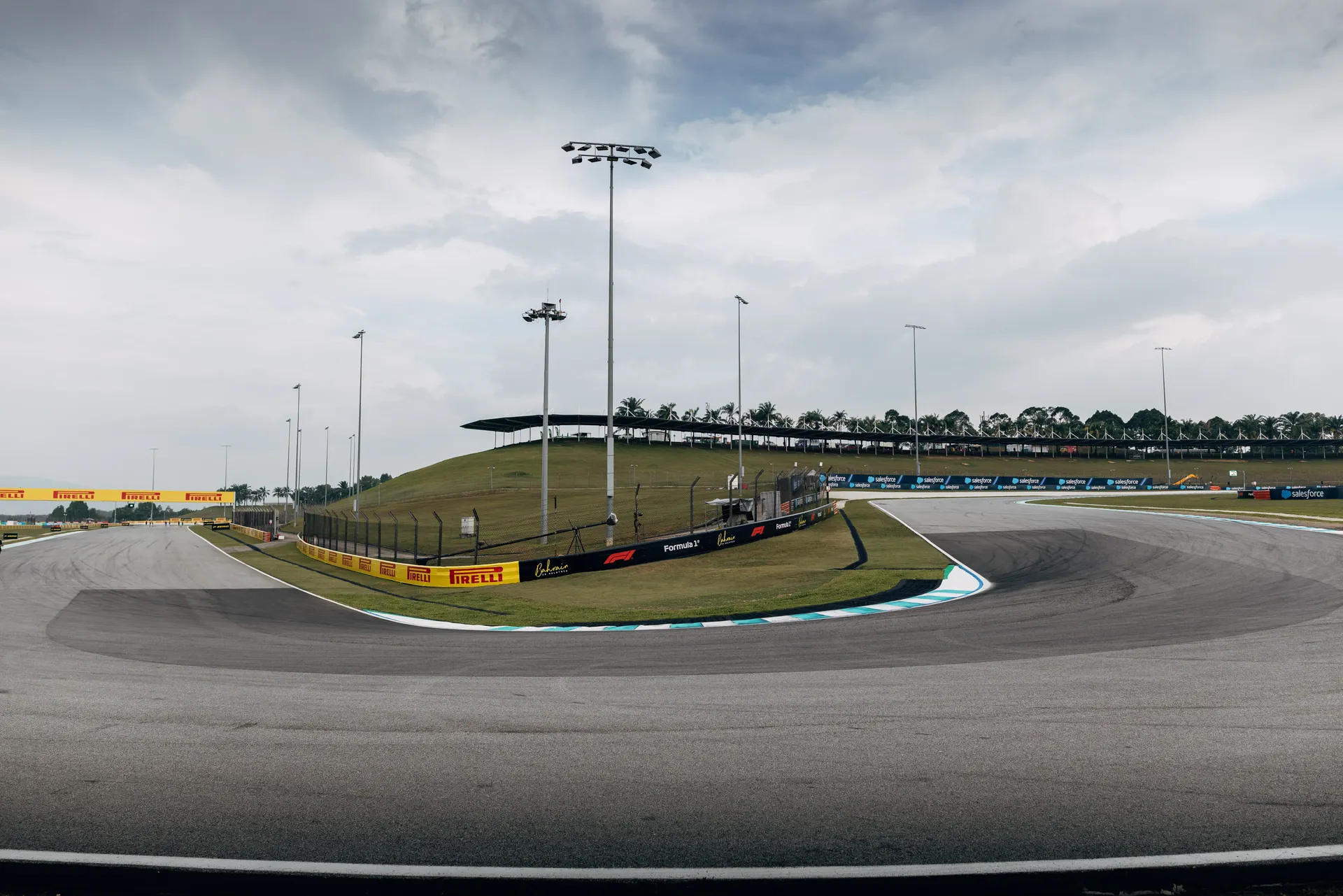 Tight corner at Bahrain International Circuit with blue and white kerbs