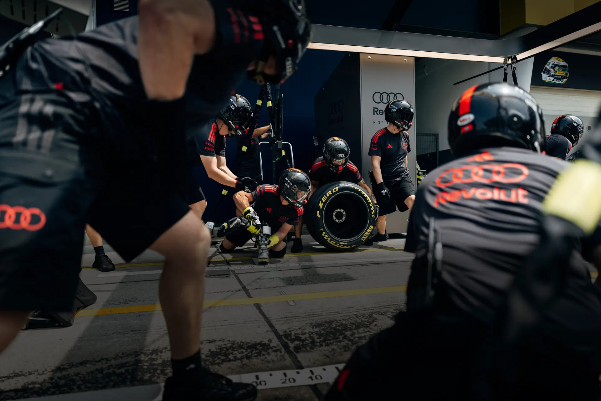 Audi Revolut F1® Team pitstop crew in action at the Bahrain GP 2026 during FP1