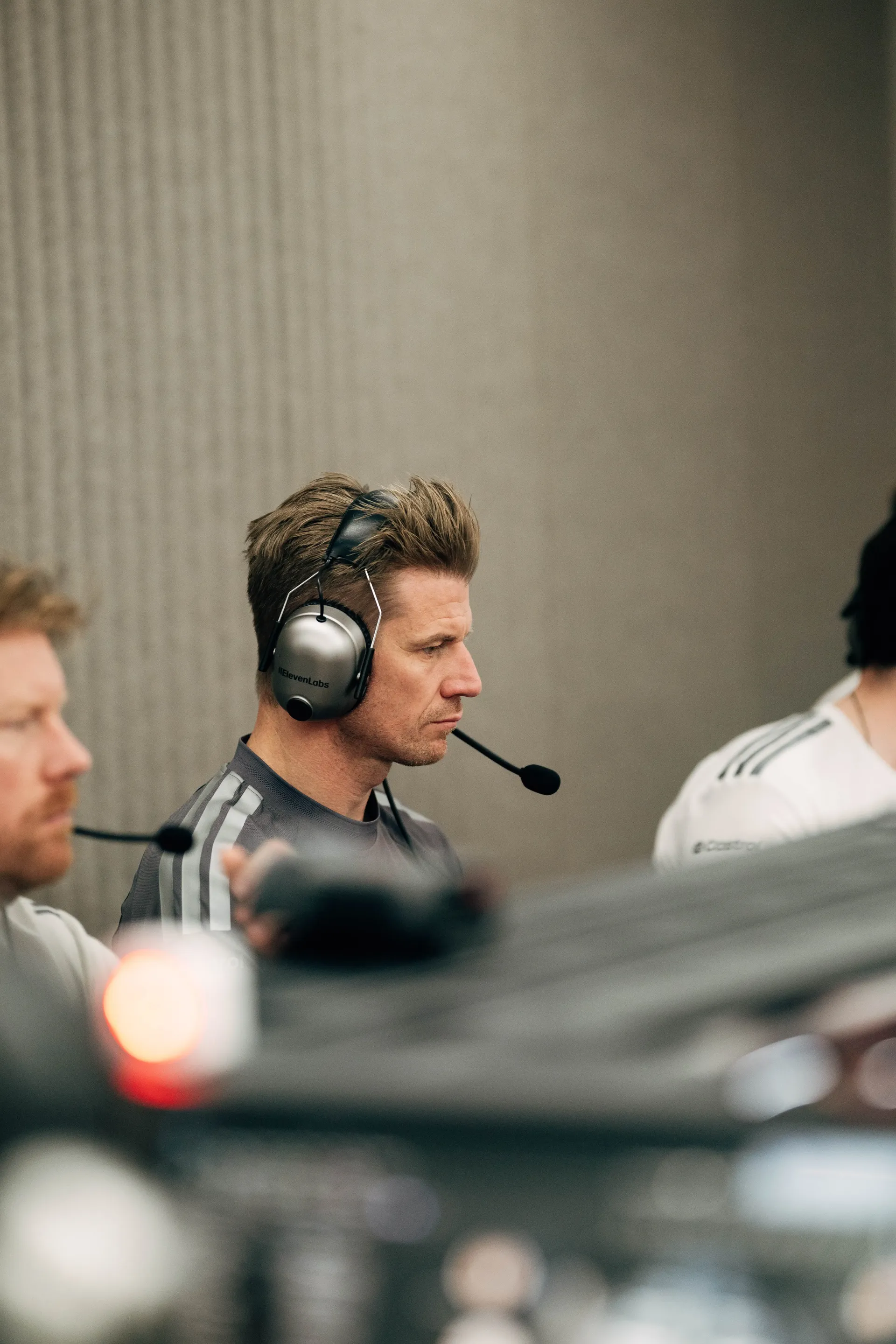 Nico Hulkenberg driver at the Audi Revolut F1® Team inside the garage wearing headphones at the Barcelona Catalunya Grand Prix 2026