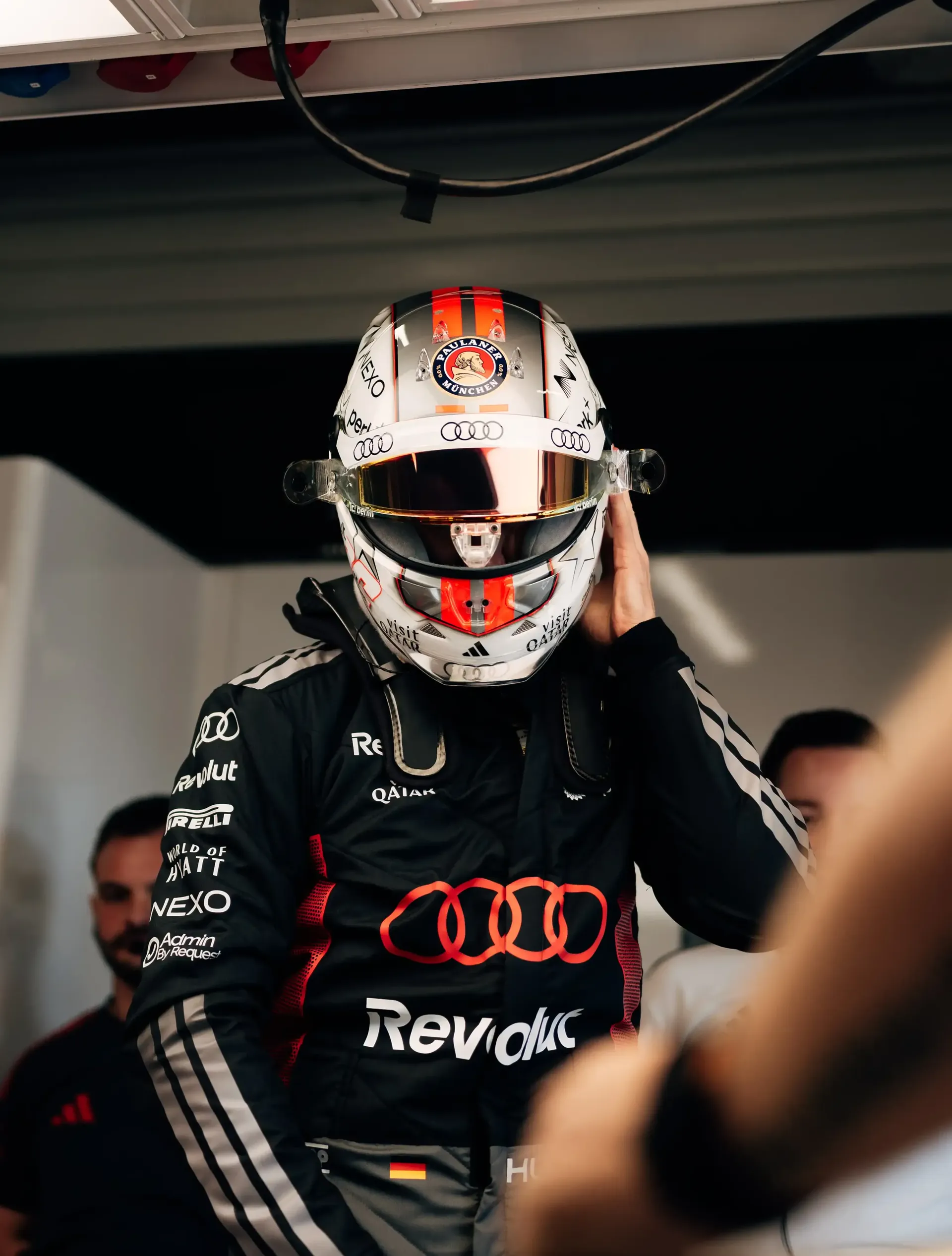 Nico Hulkenberg driver at the Audi Revolut F1® Team inside the garage jumping out his cockpit at the Barcelona Catalunya Grand Prix 2026