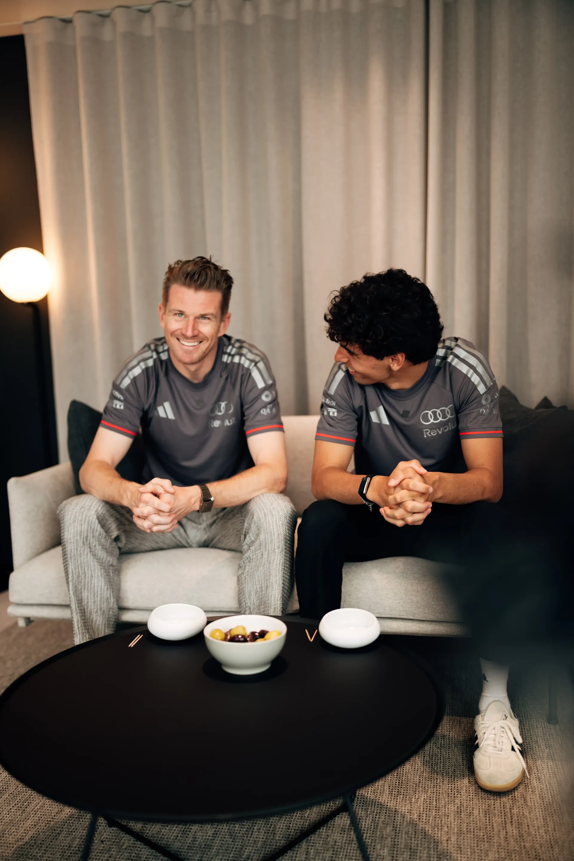 Nico Hulkenberg and Gabriel Bortoleto, drivers at the Audi Revolut F1® Team, during arrival day activities in Barcelona.