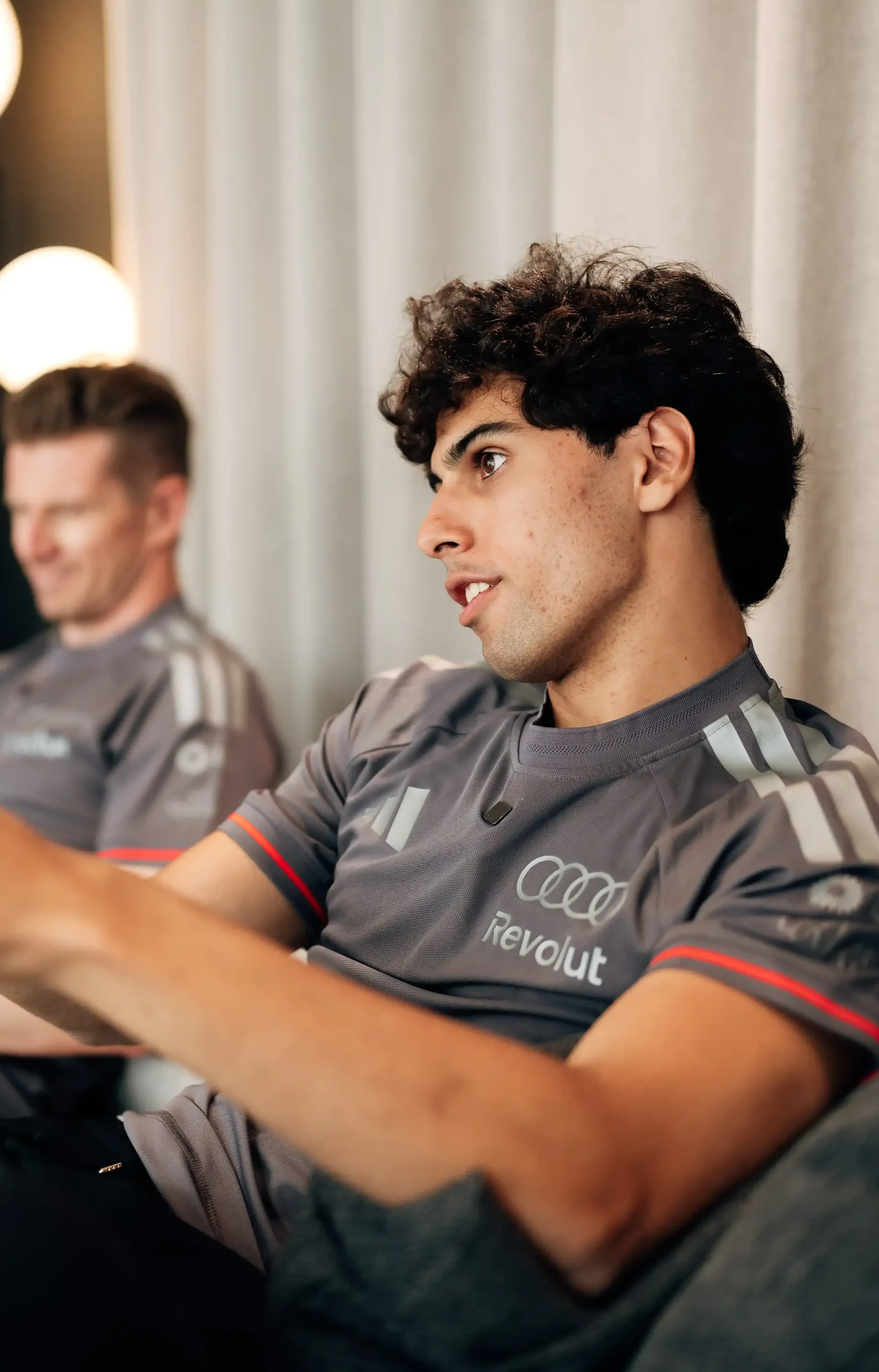 Nico Hulkenberg and Gabriel Bortoleto, drivers at the Audi Revolut F1® Team, sharing a moment during arrival day in Barcelona.