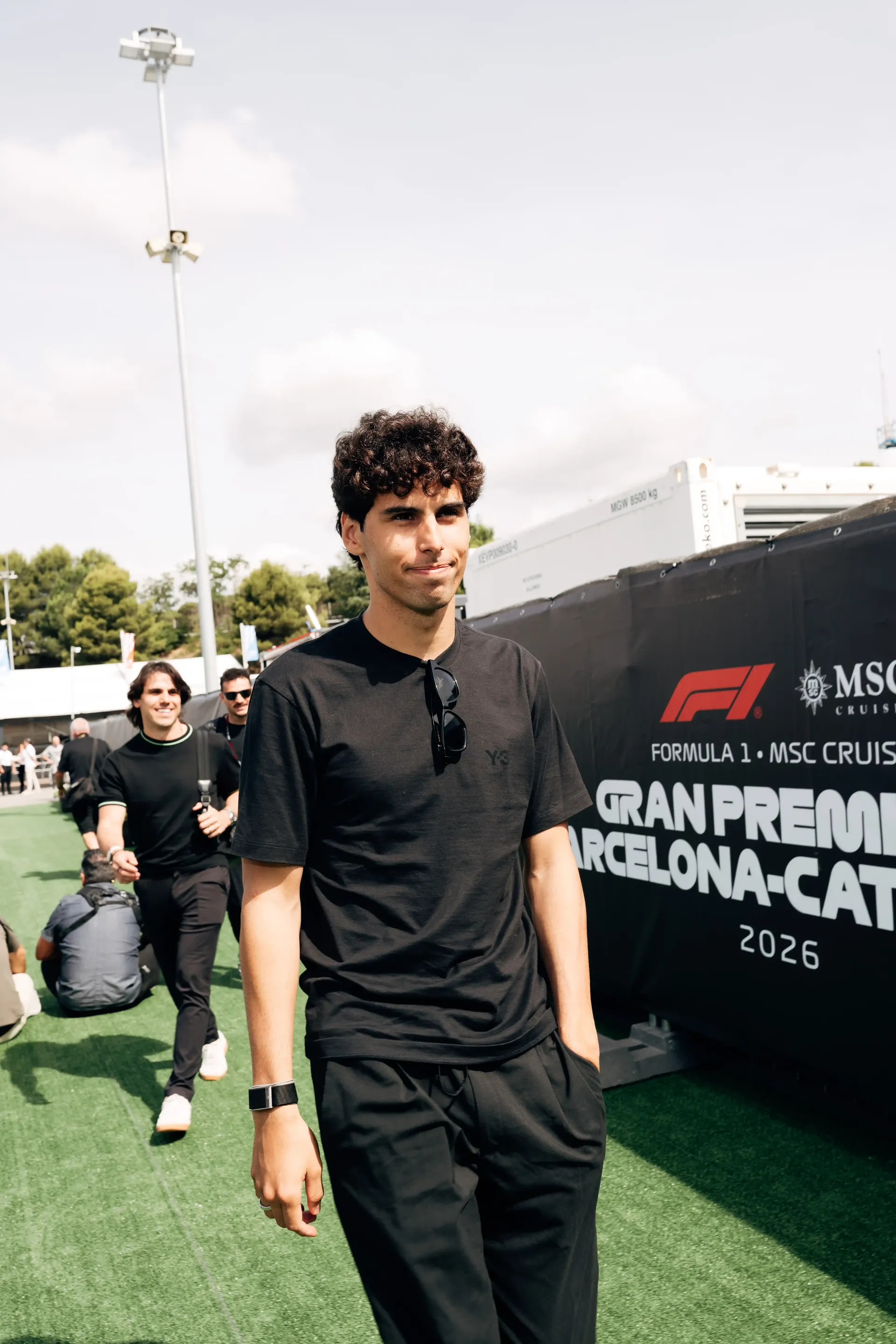 Gabriel Bortoleto, driver at the Audi Revolut F1® Team, walking through the paddock in Barcelona.