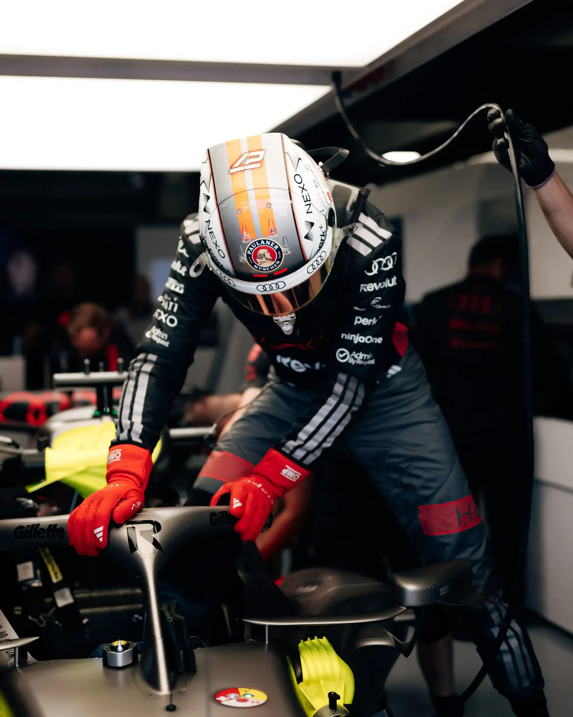 Nico Hulkenbgerg driver at the Audi Revolut F1® Team jumping out of ther cockpit inside the garage at the Barcelona Catalunya Grand Prix 2026 