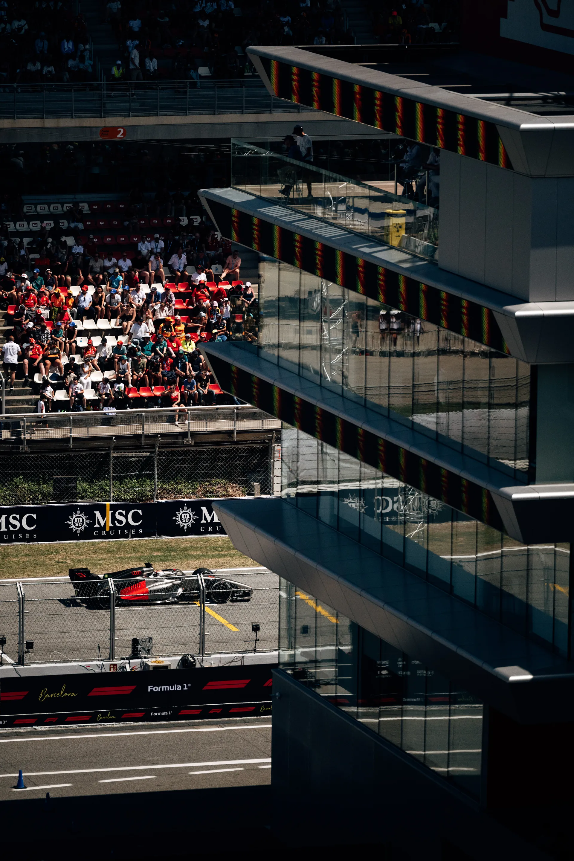 Audi R26 passing the main grandstand at Circuit de Barcelona-Catalunya during the Barcelona race weekend.
