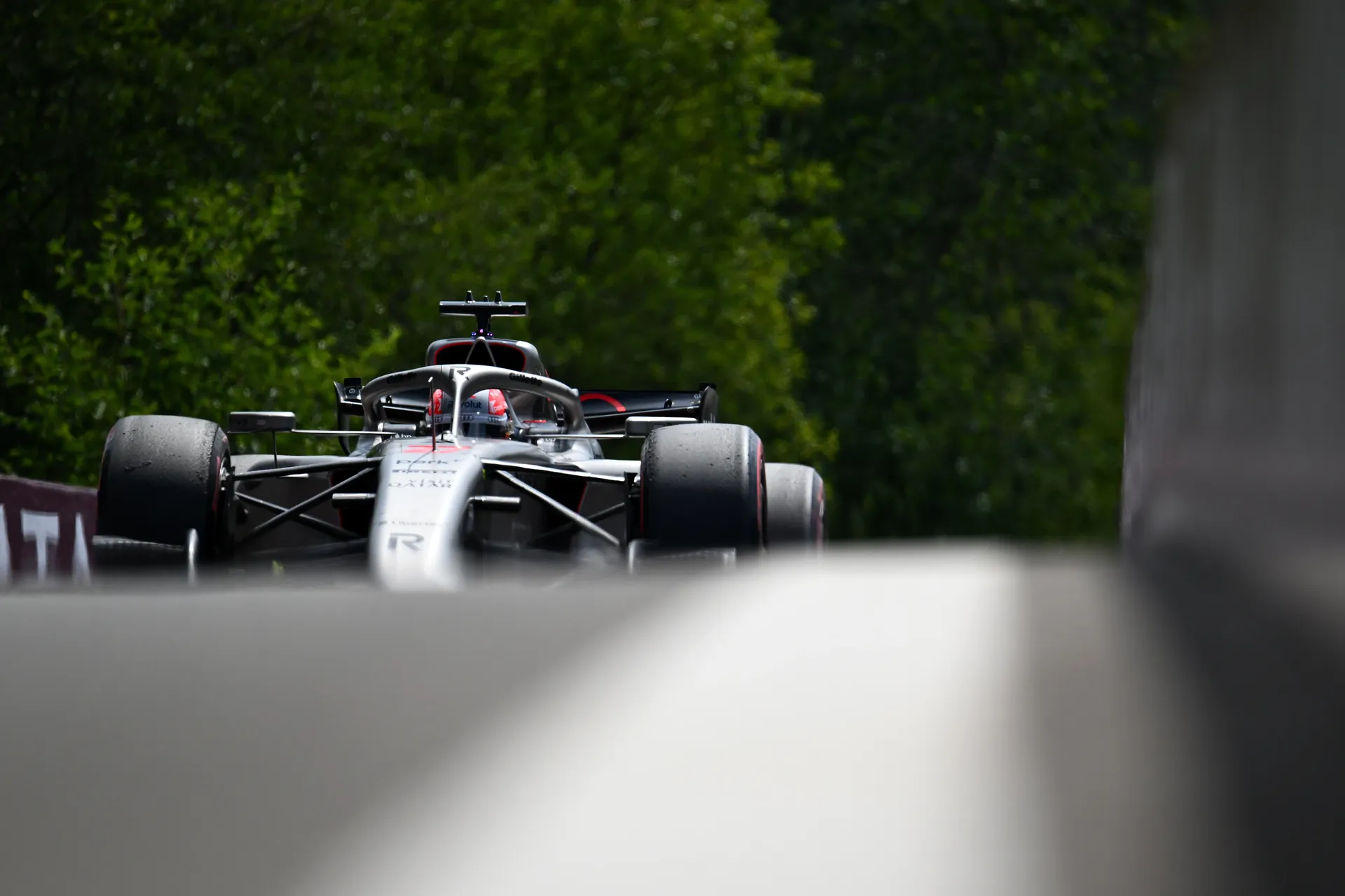 Audi R26 of Audi Revolut F1® Team approaching head on through a narrow section of the Spa circuit