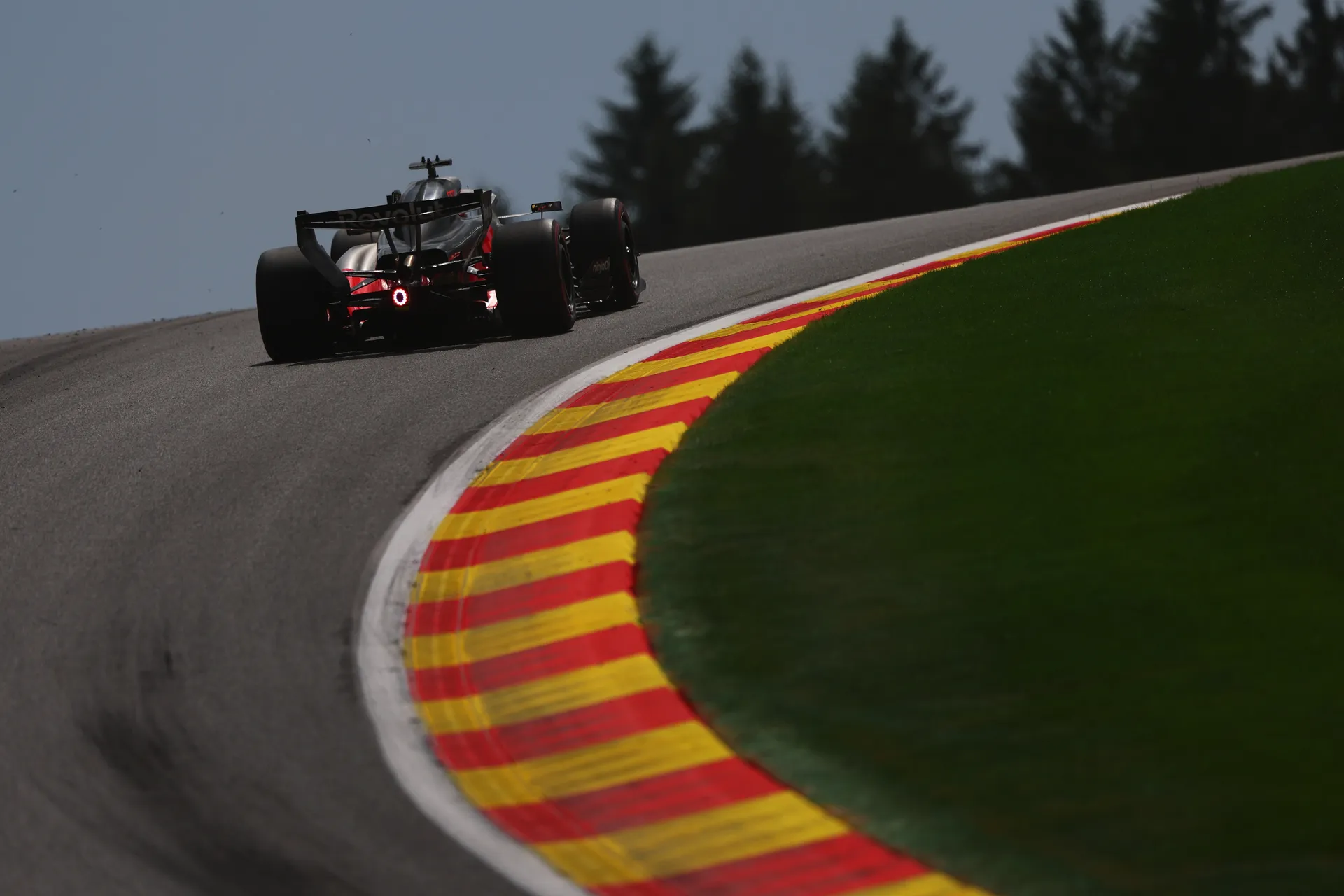 Audi R26 of Audi Revolut F1® Team exiting an uphill corner at Spa Francorchamps