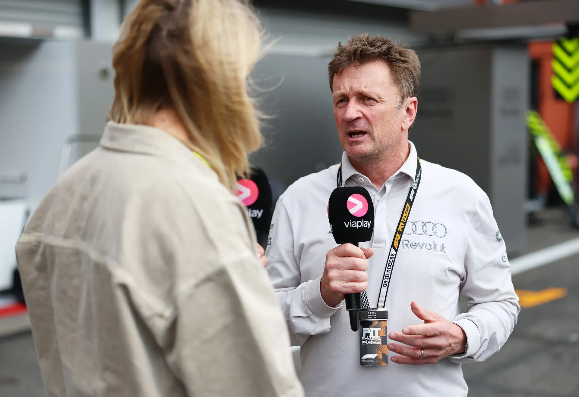 Allan McNish of Audi Revolut F1® Team speaking during a trackside interview in the paddock at Spa Francorchamps