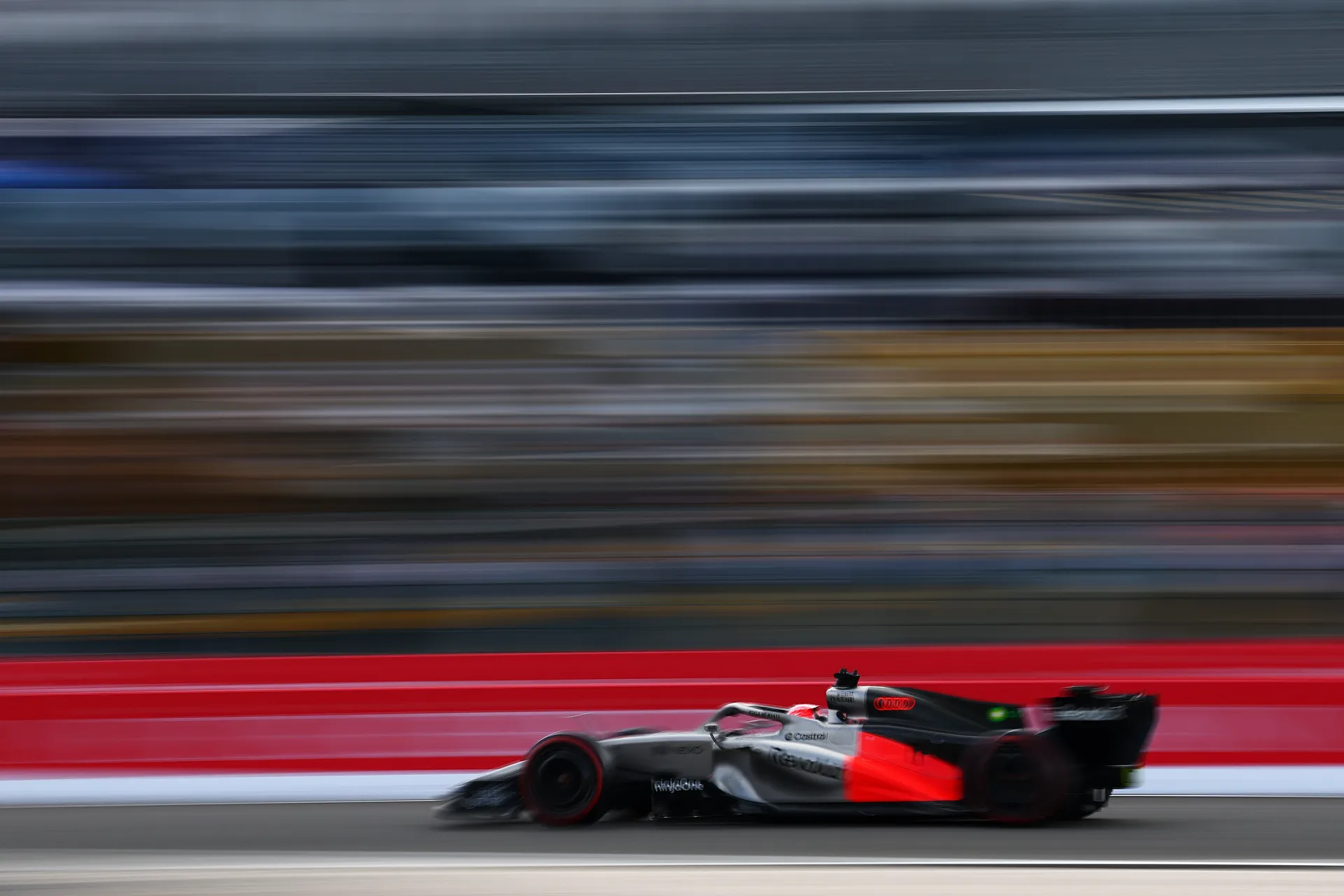 Audi Revolut F1® Team car captured in motion blur at high speed during qualifying at Spa Francorchamps