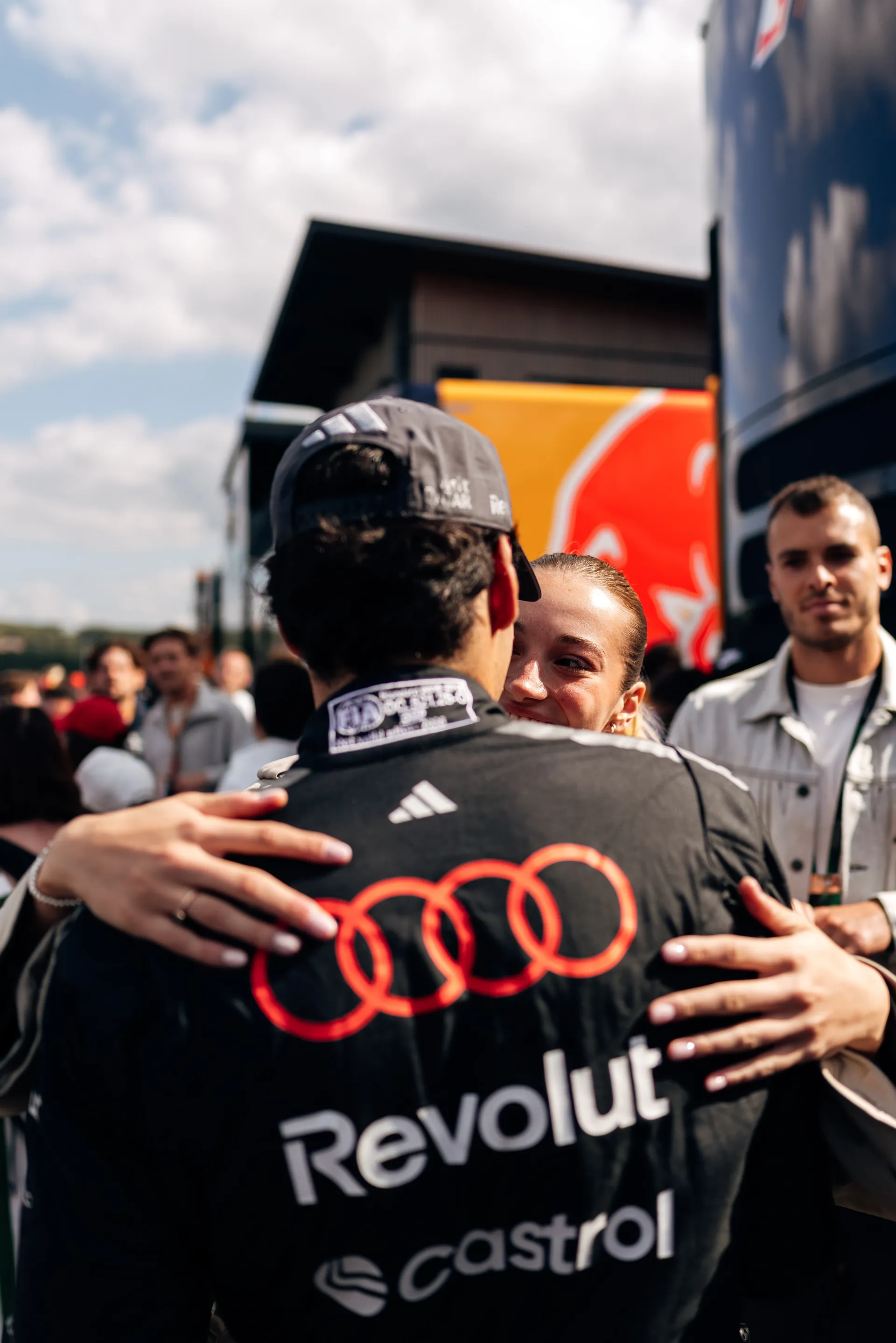 Gabriel Brotoleto shares hug with Audi Revolut F1® Team member inside the garage during the race weekend