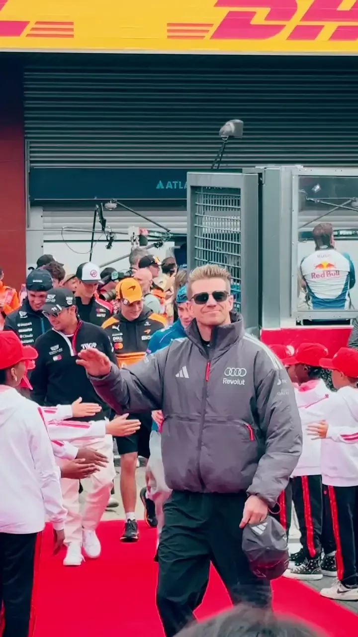 Video clip of the drivers parade at Spa Francorchamps featuring Gabriel Bortoleto and Nico Hulkenberg of Audi Revolut F1® Team alongside other Formula 1 drivers greeting fans ahead of the Belgian Grand Prix