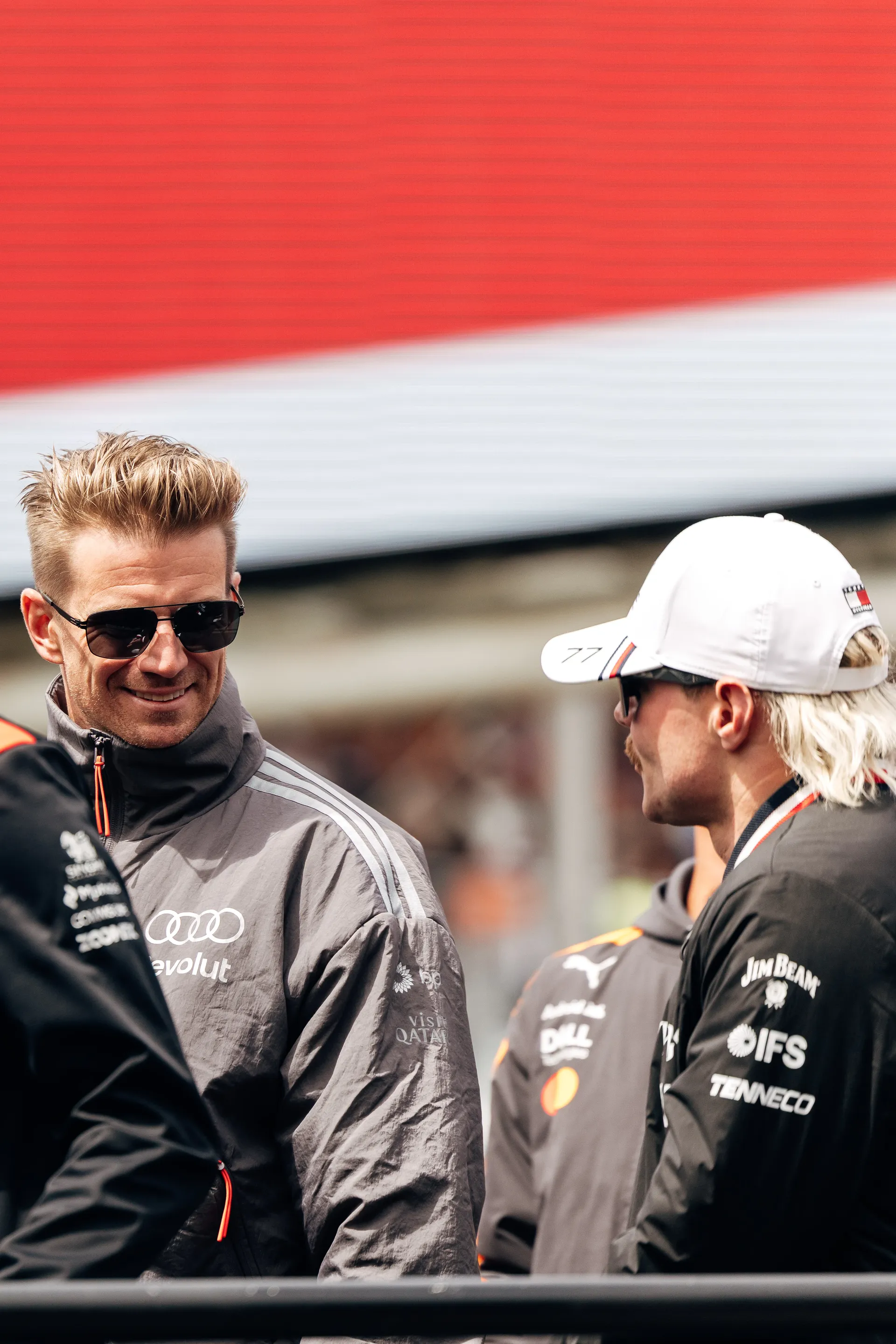 Nico Hulkenberg of Audi Revolut F1® Team chats with Max Verstappen of Red Bull Racing during the drivers parade at Spa Francorchamps