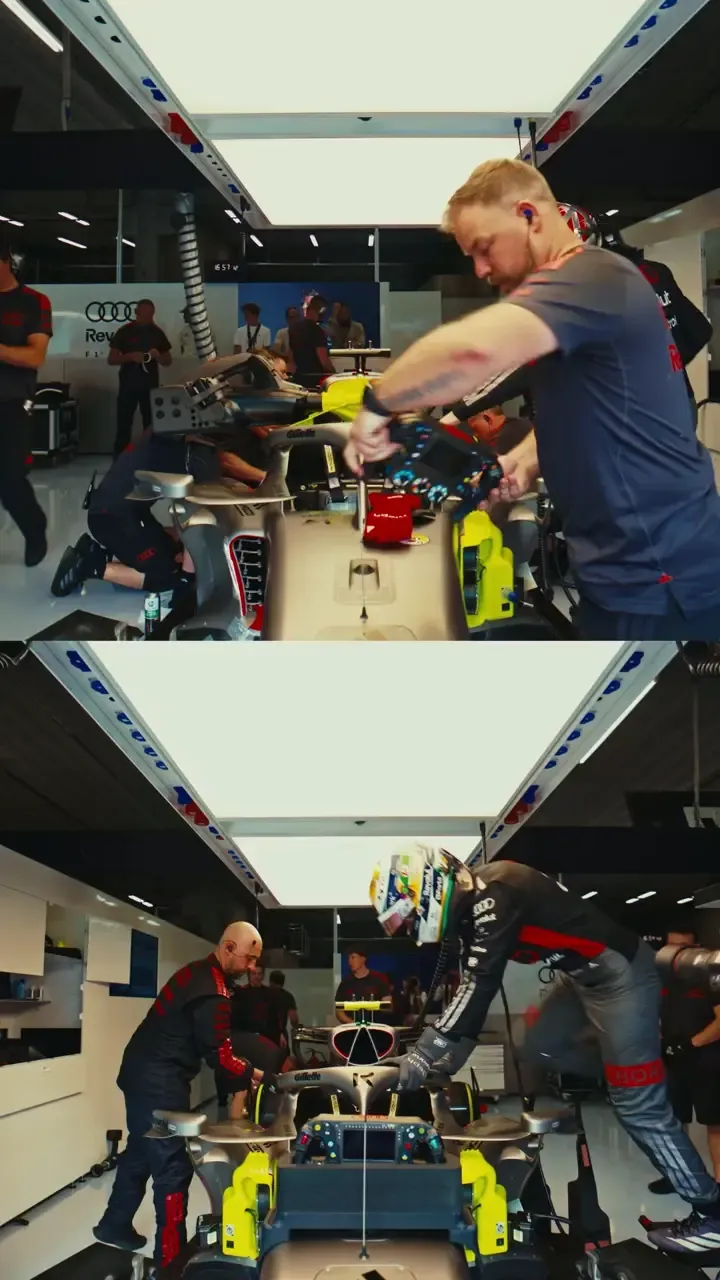 Gabriel Bortoleto climbs into the Audi Revolut F1® Team car in the garage during qualifying preparations at the Belgian Grand Prix.