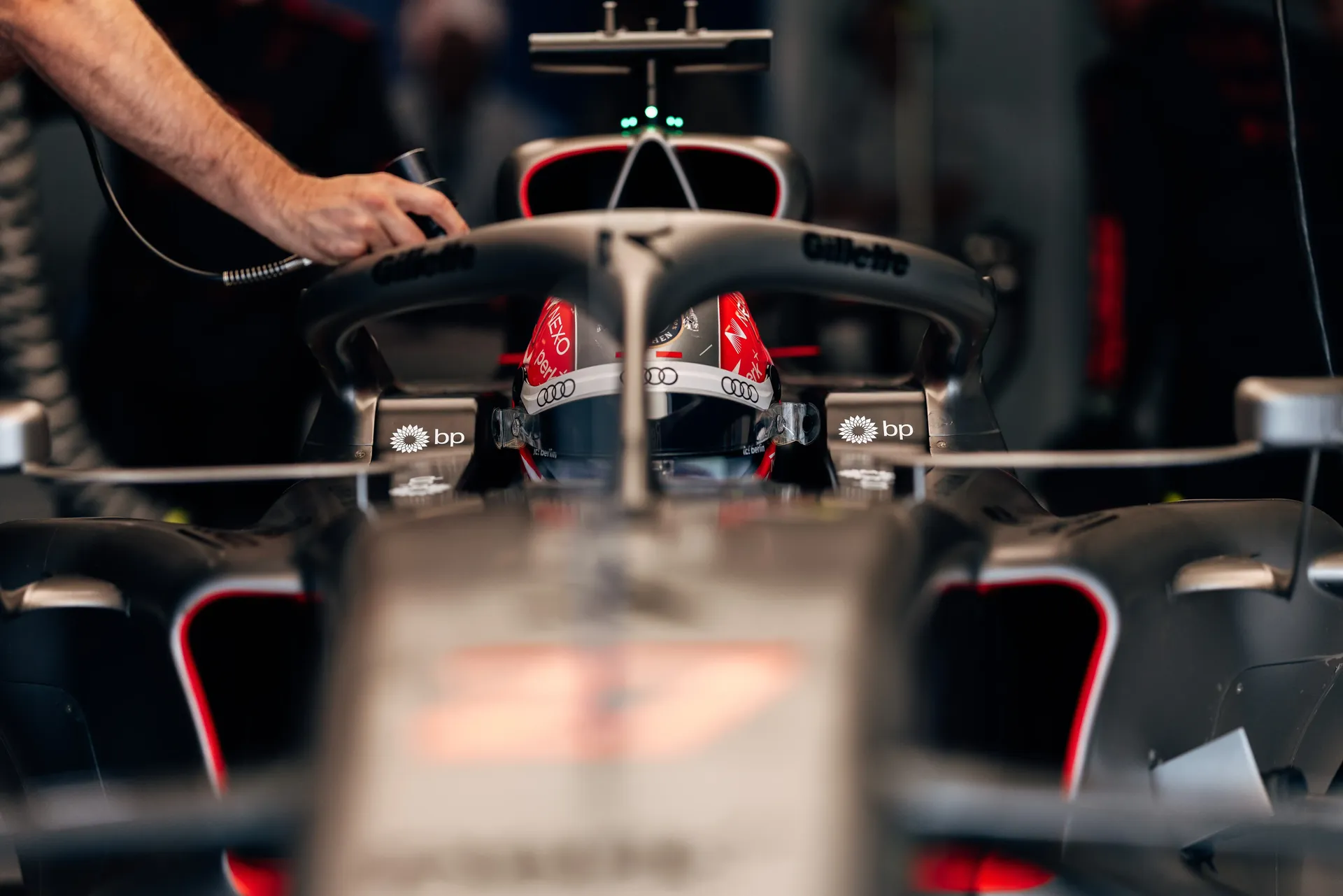 Front view of the Audi Revolut F1® Team Formula 1® car Audi R26 as mechanics complete final preparations before FP1.