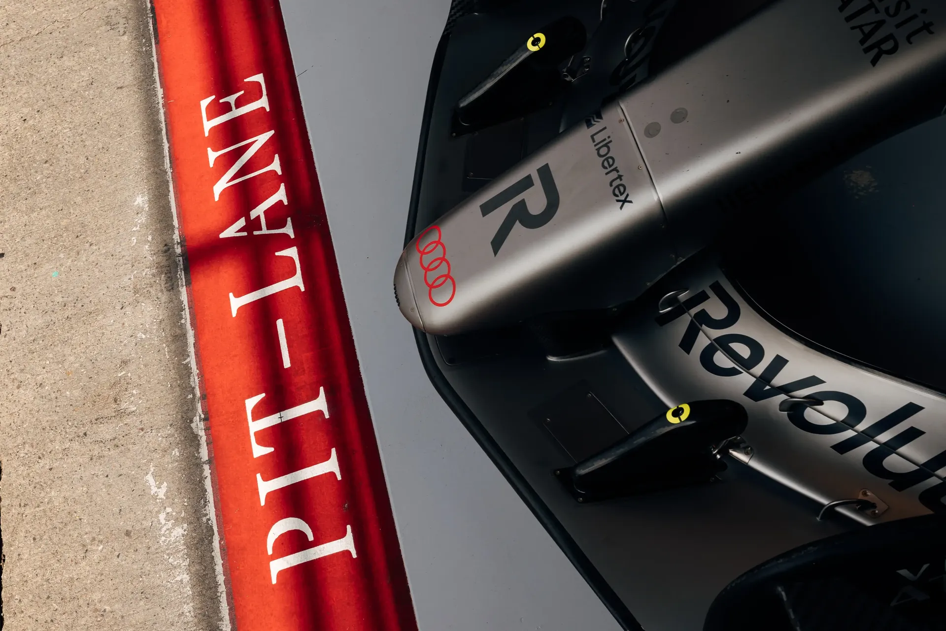 Close-up of the Audi Revolut F1® Team Formula 1® car highlighting the front wing and bodywork details before FP1.