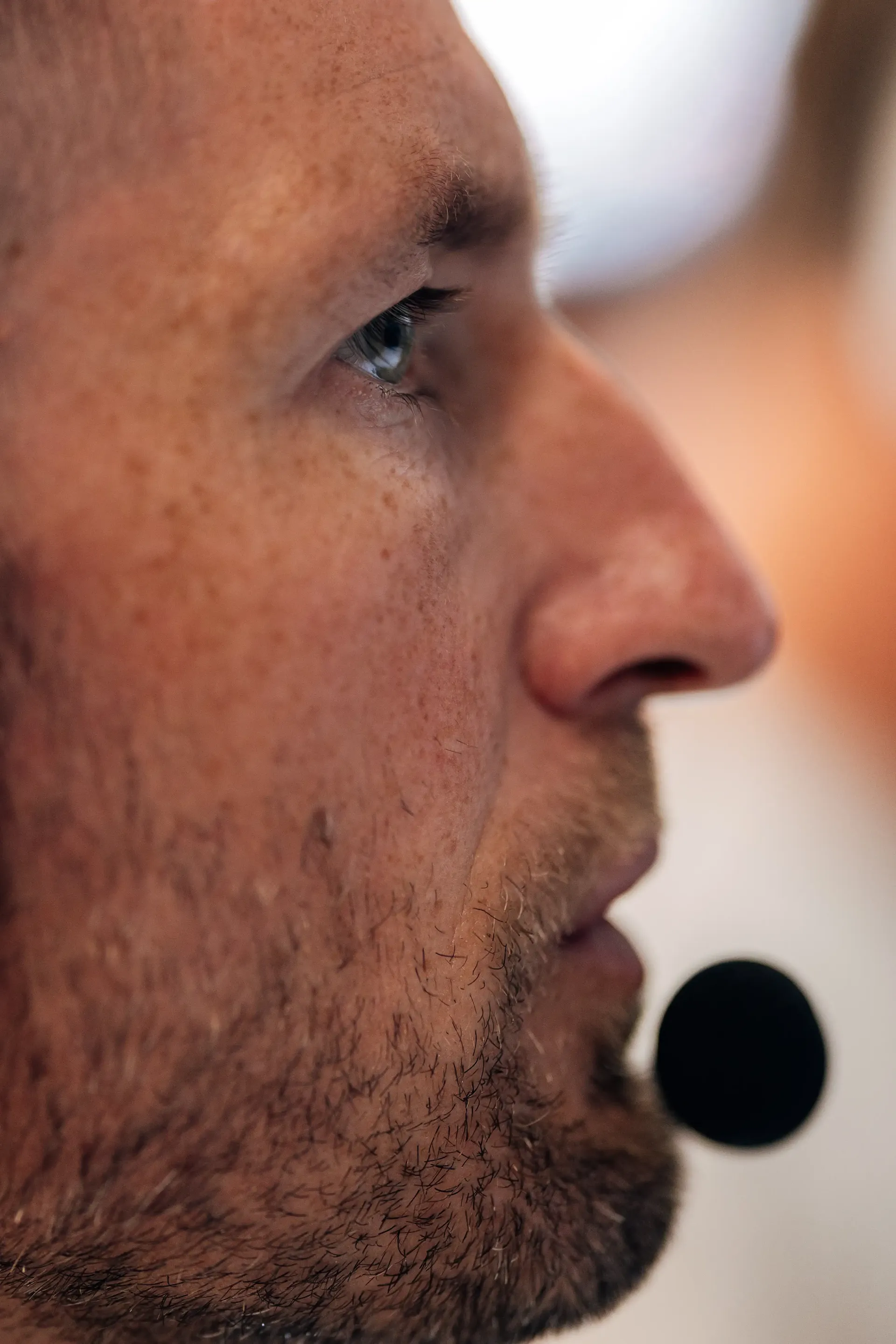 Audi Revolut F1® Team engineer wearing a headset monitors the session during FP2 at the 2026 Belgian Grand Prix in Spa-Francorchamps.
