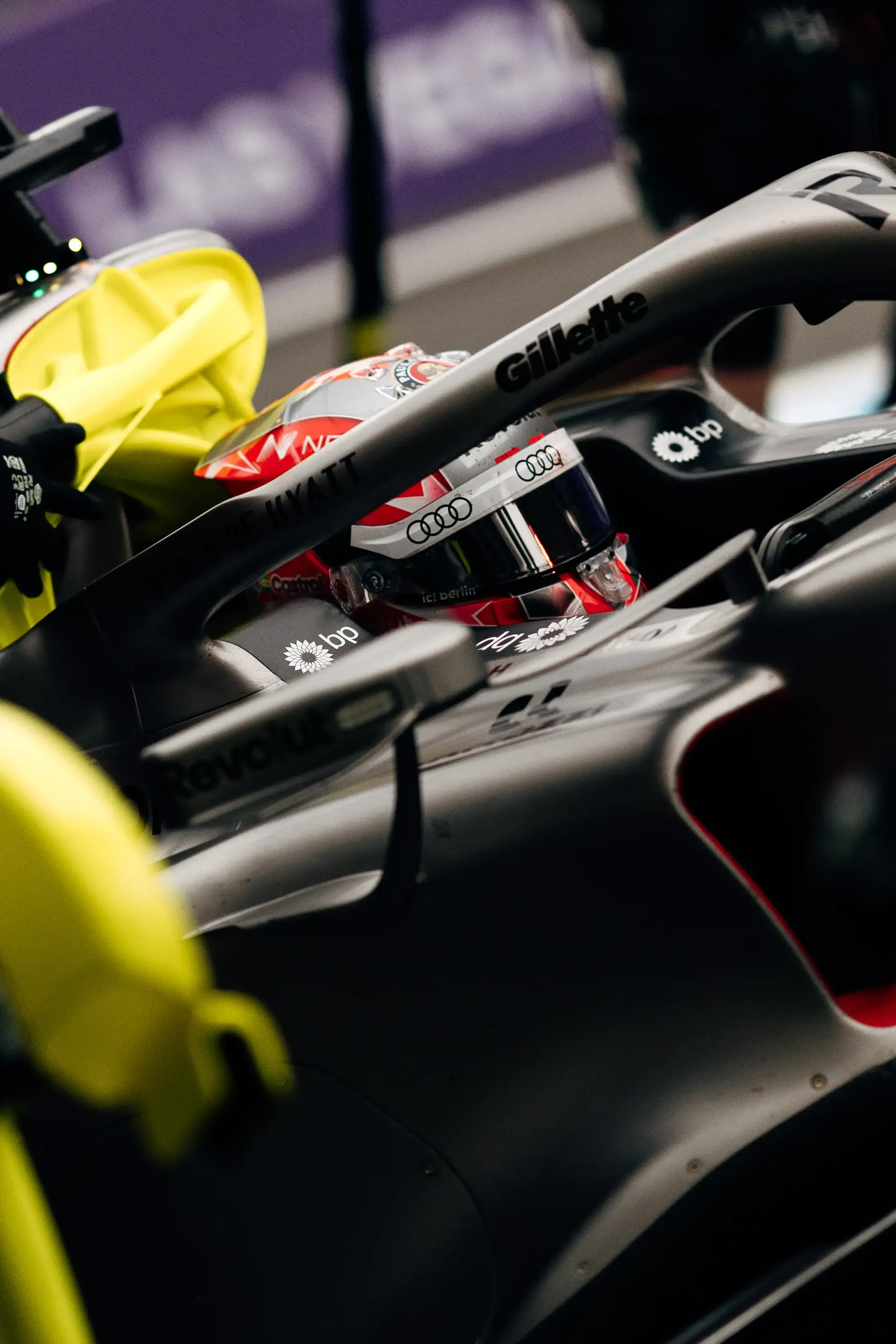 Close-up of the Audi Revolut F1® Team car Audi R26 in the garage as mechanics prepare it during FP2 at the 2026 Belgian Grand Prix in Spa-Francorchamps.