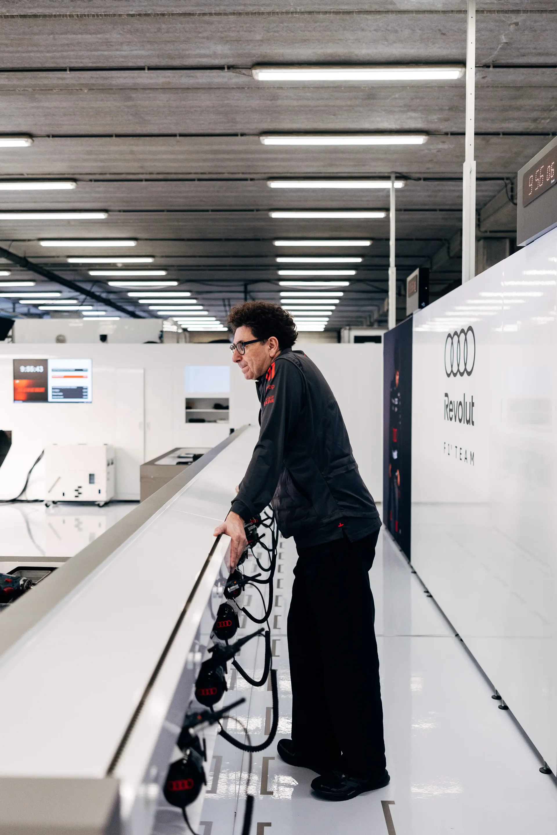 Audi Revolut F1® Team mechanic overlooks the Formula 1® garage during preparations at Spa-Francorchamps.