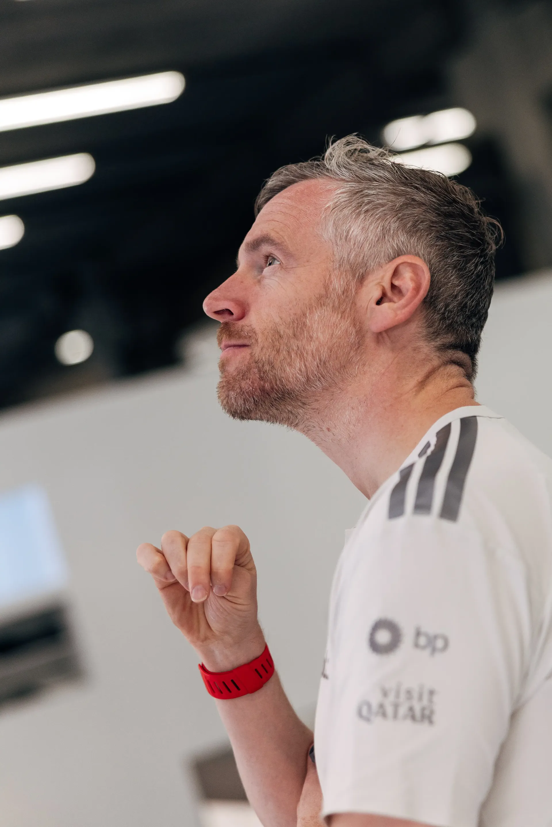 Audi Revolut F1® Team engineer watches the action from the Formula 1® garage during the Belgian Grand Prix weekend.