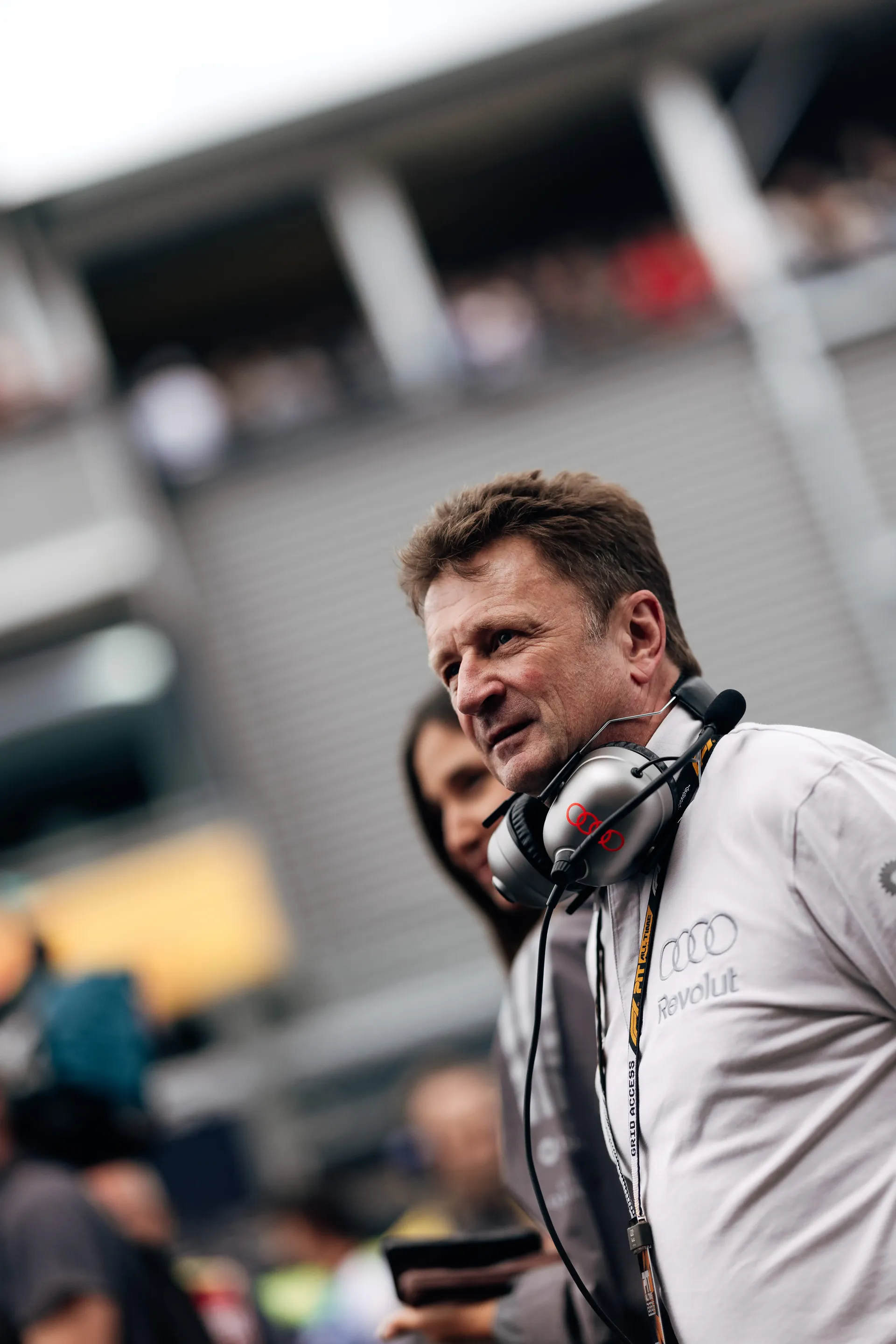 Allan McNish racing director at Audi Revolut F1® Team in front of the garage at the Belgian Grand Prix 2026
