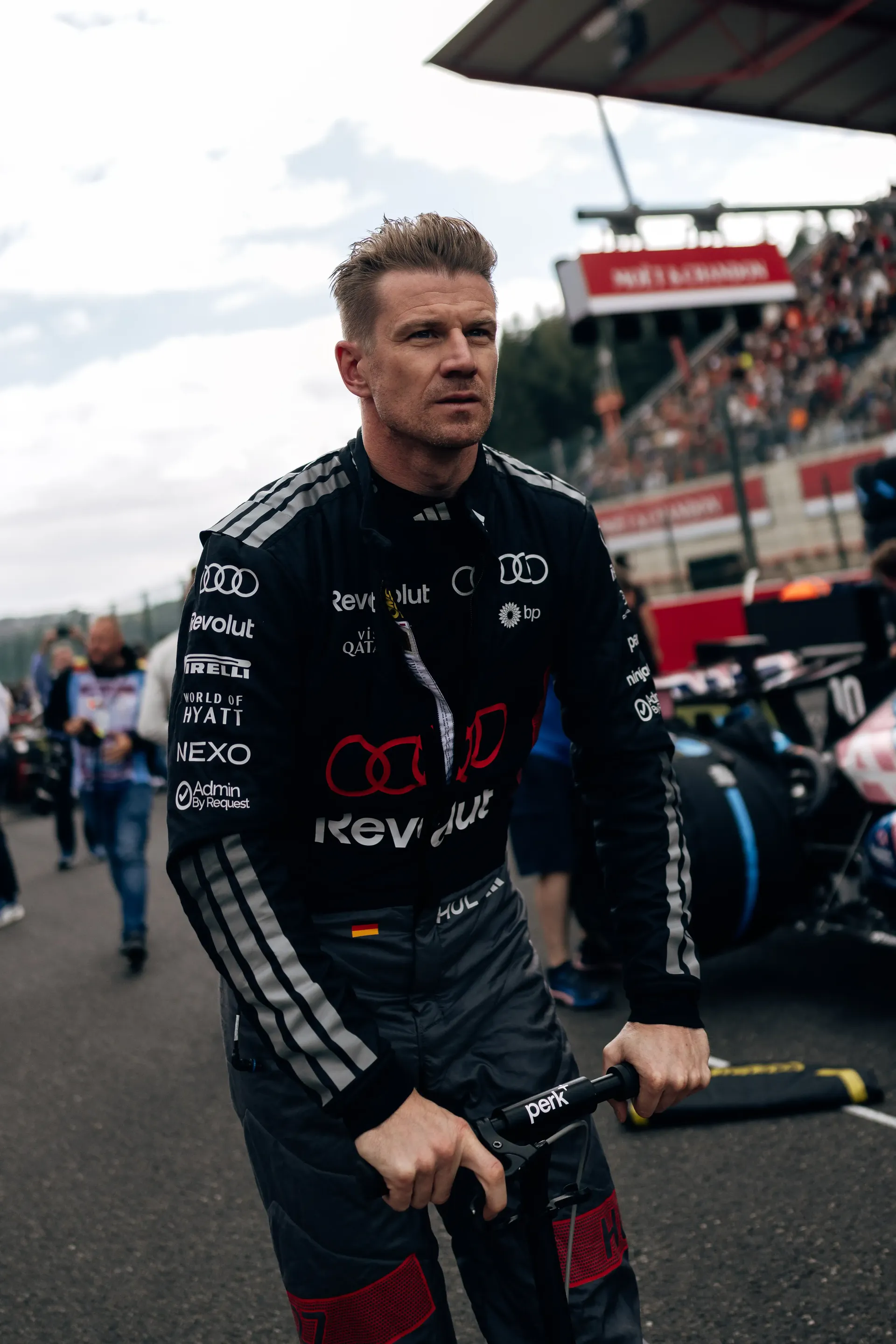 Nico Hulkenberg driver at Audi Revolut F1® Team cruising around the paddock at the Belgian Grand Prix 2026