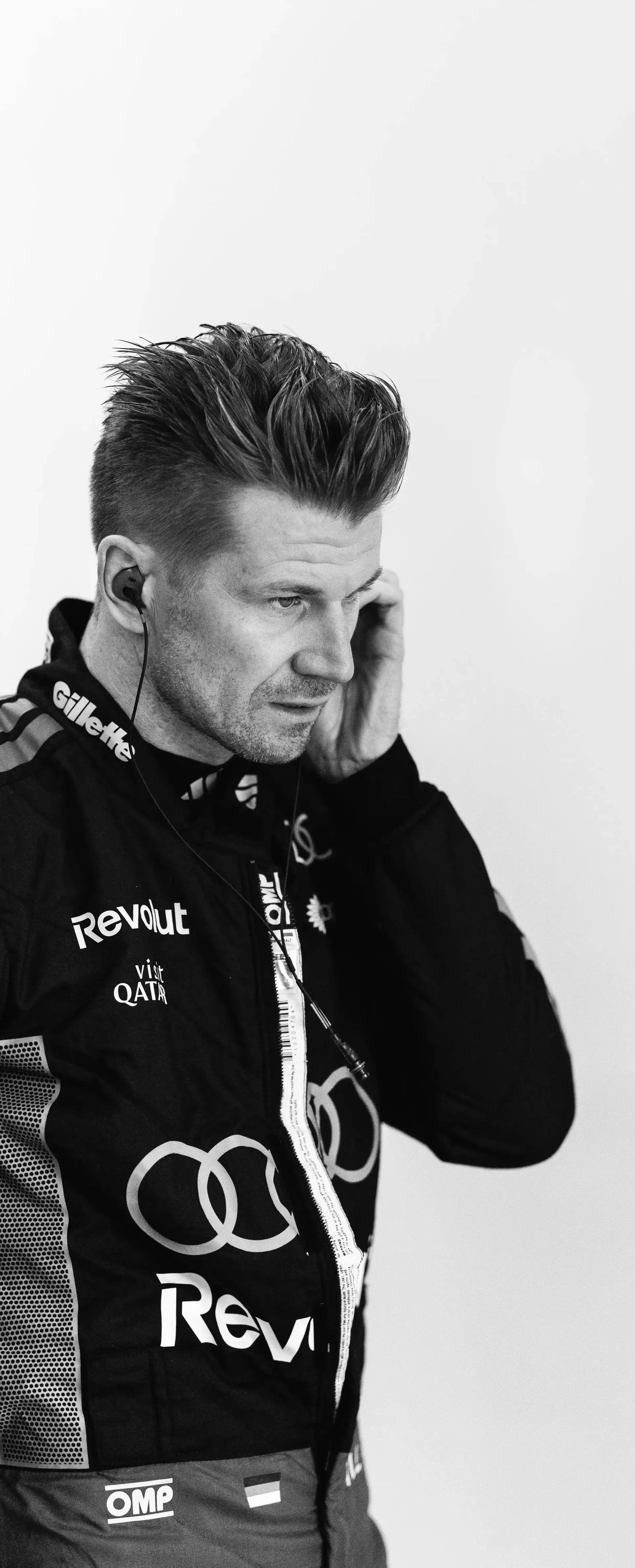 Black and white Shot of Nico Hulkenberg driver at the Audi Revolut F1® Team inside the garage at the Belgian Grand Prix 2026