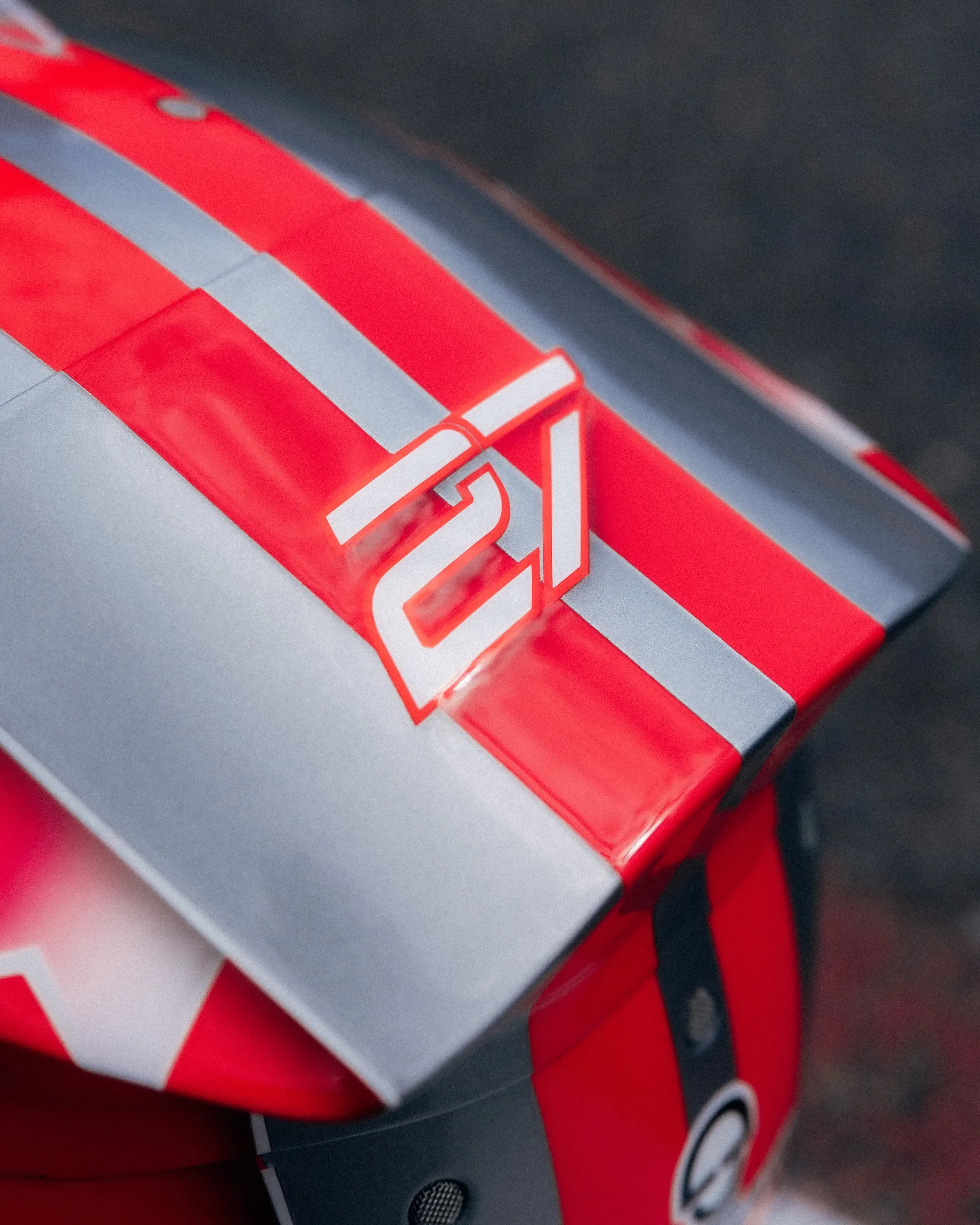 Close-up detail of Nico Hulkenberg's special Belgian Grand Prix helmet highlighting the number 27 and silver-red design elements for the Audi Revolut F1® Team.