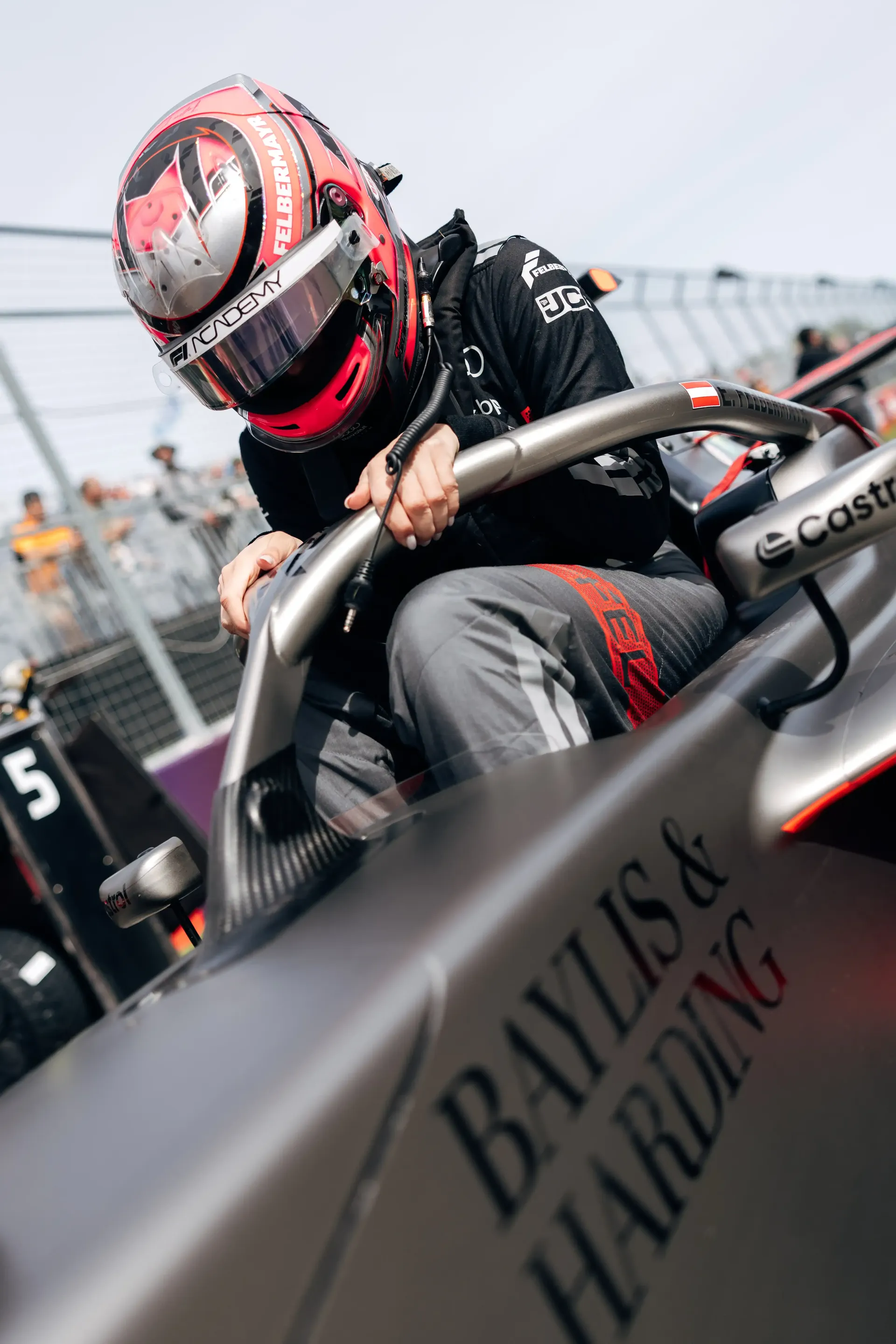 Cockpit close up of Emma Felbermayr jumping into the cockpit of the Audi Revolut F1® Team Academy car at the Canadian Grand Prix 2026