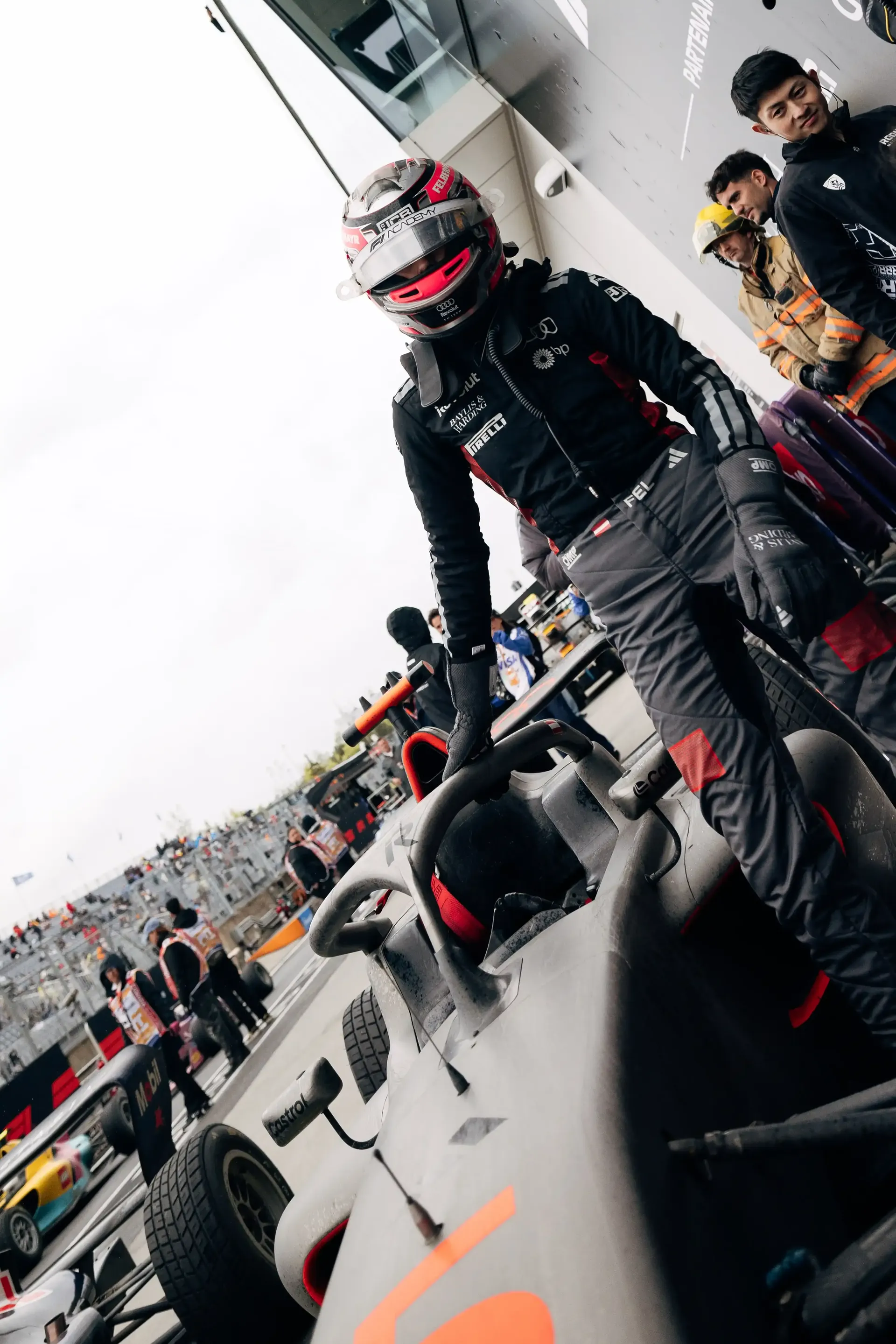 Emma Felbermayr driver at the Audi Revolut F1® Team Academy standing next to her racing car at the Canada Grand Prix 2026 on racing day
