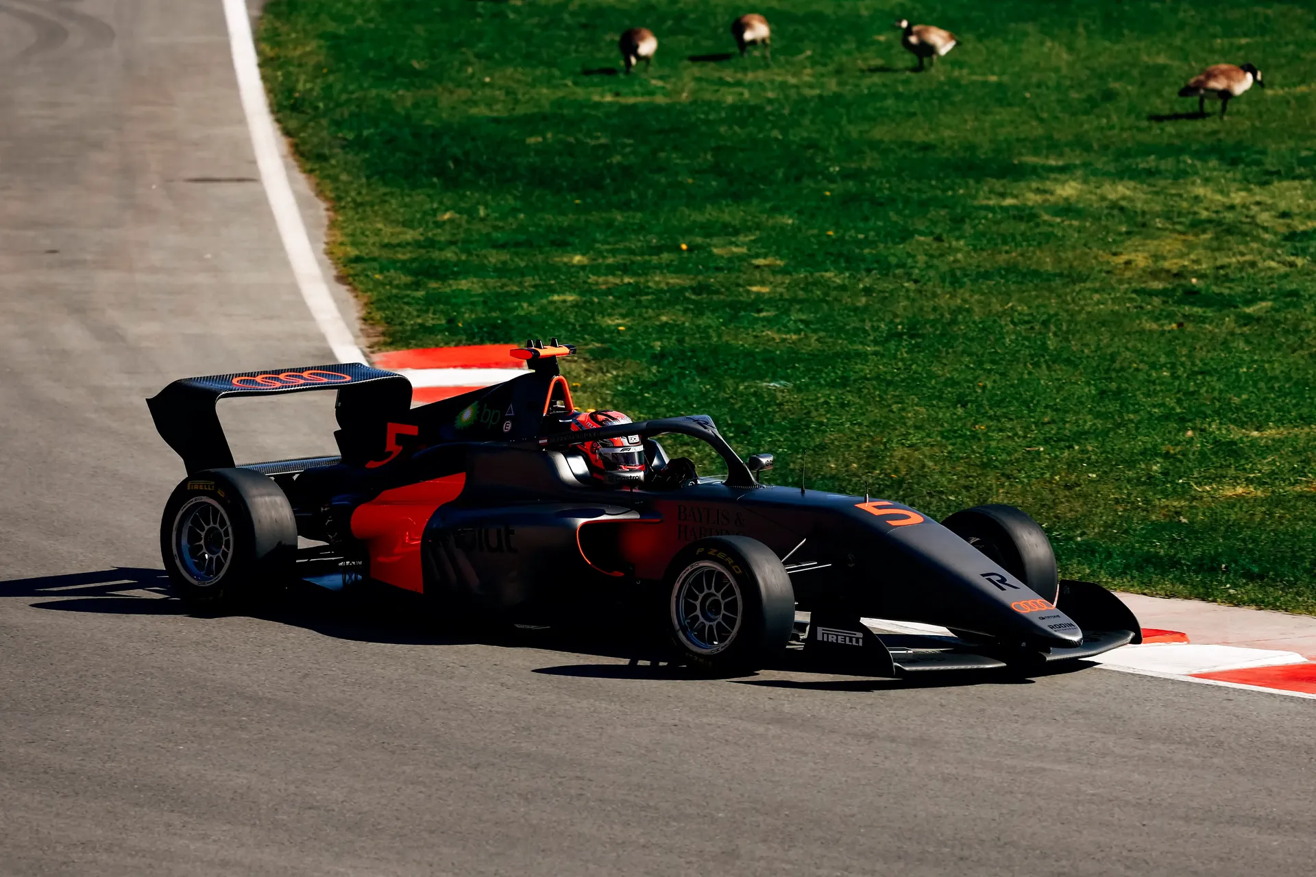 Side view of the Audi Revolut F1® Team Academy car passing by at the Canada Grand Prix 2026