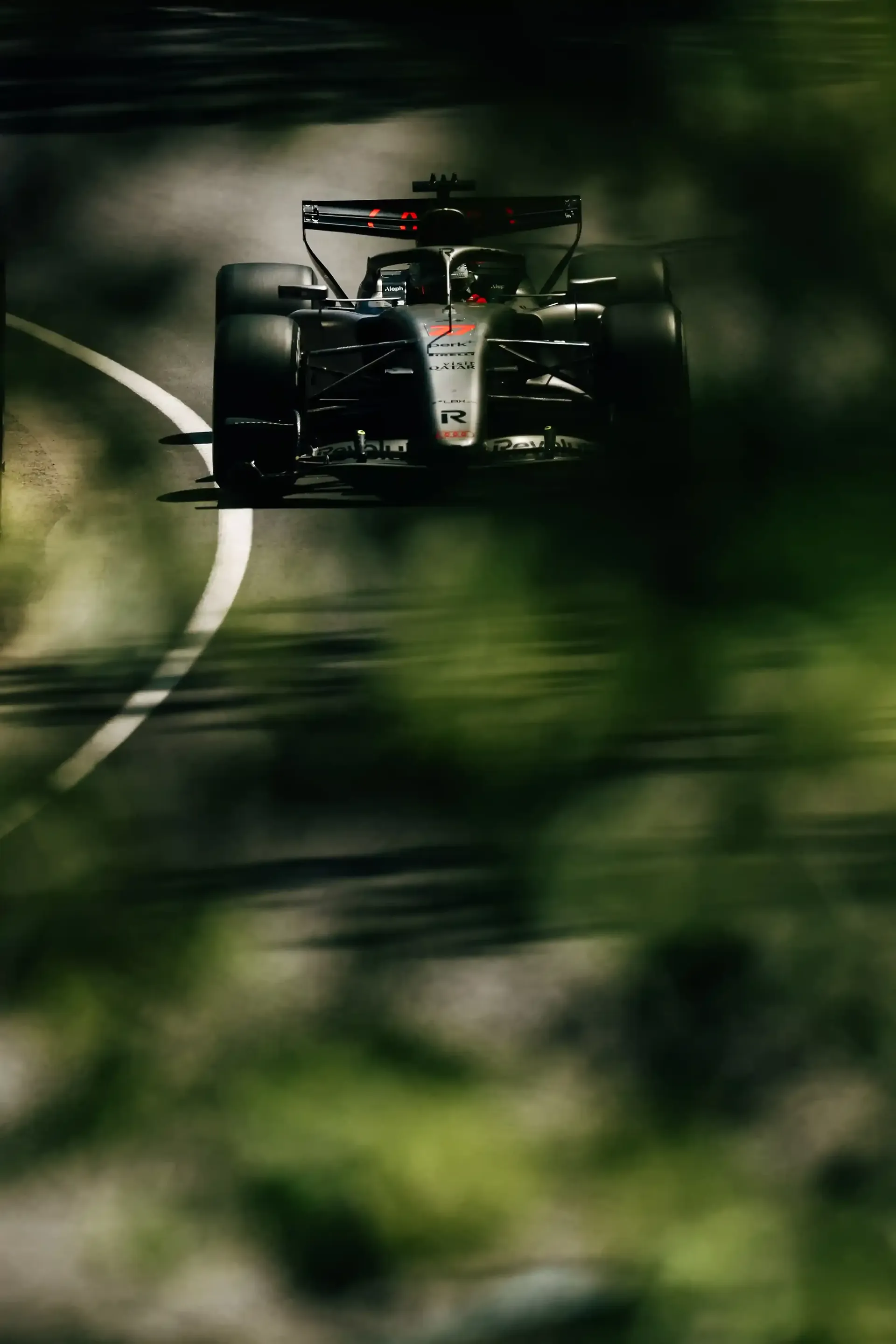 Front view of the Audi Revolut F1® Team car at the Canada Grand Prix 2026 spotted trough bushes