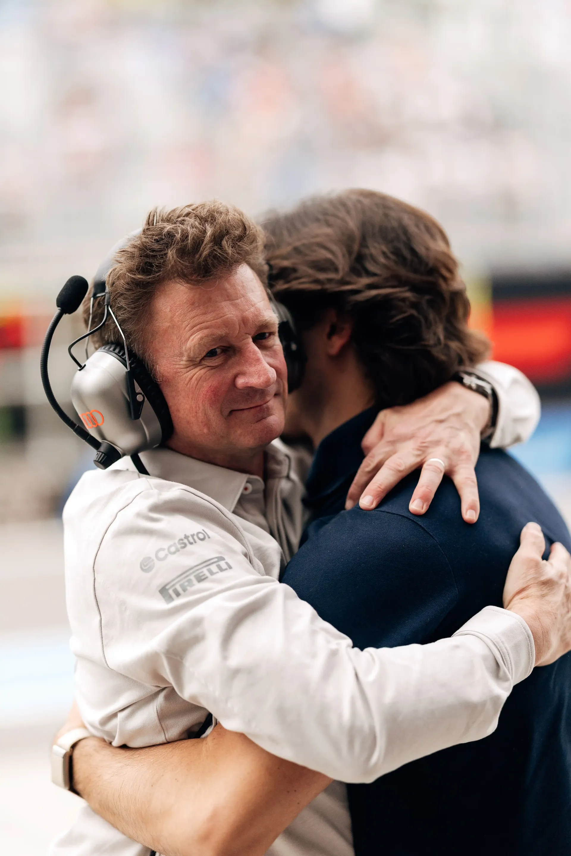 Allan McNish Racing Director at the Audi Revolut F1® Team hugging a crew member at the Canada Grand Prix 2026