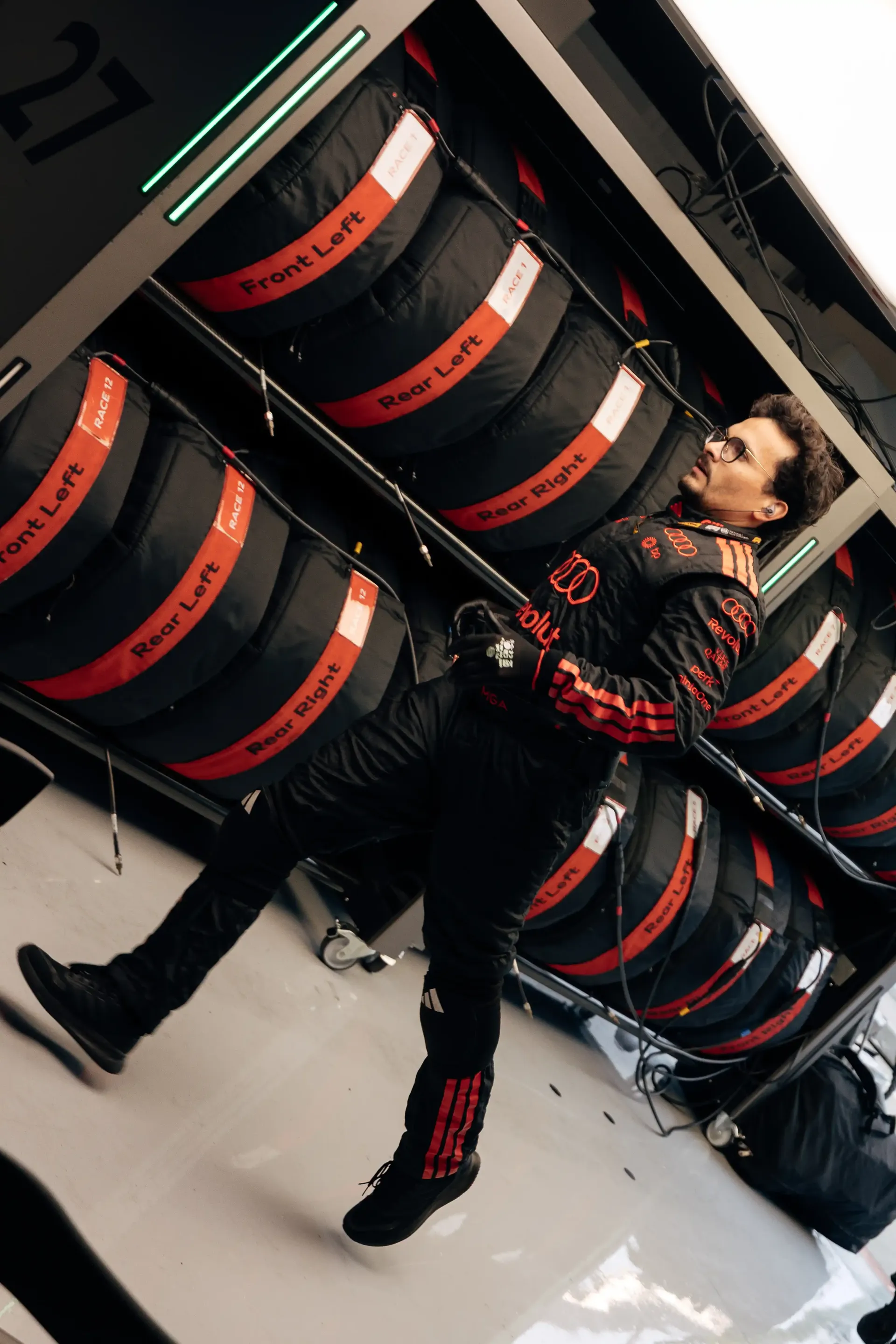 Close up of Audi Revolut F1® Team mechanic running inside the garage at the Canada Grand Prix 2026