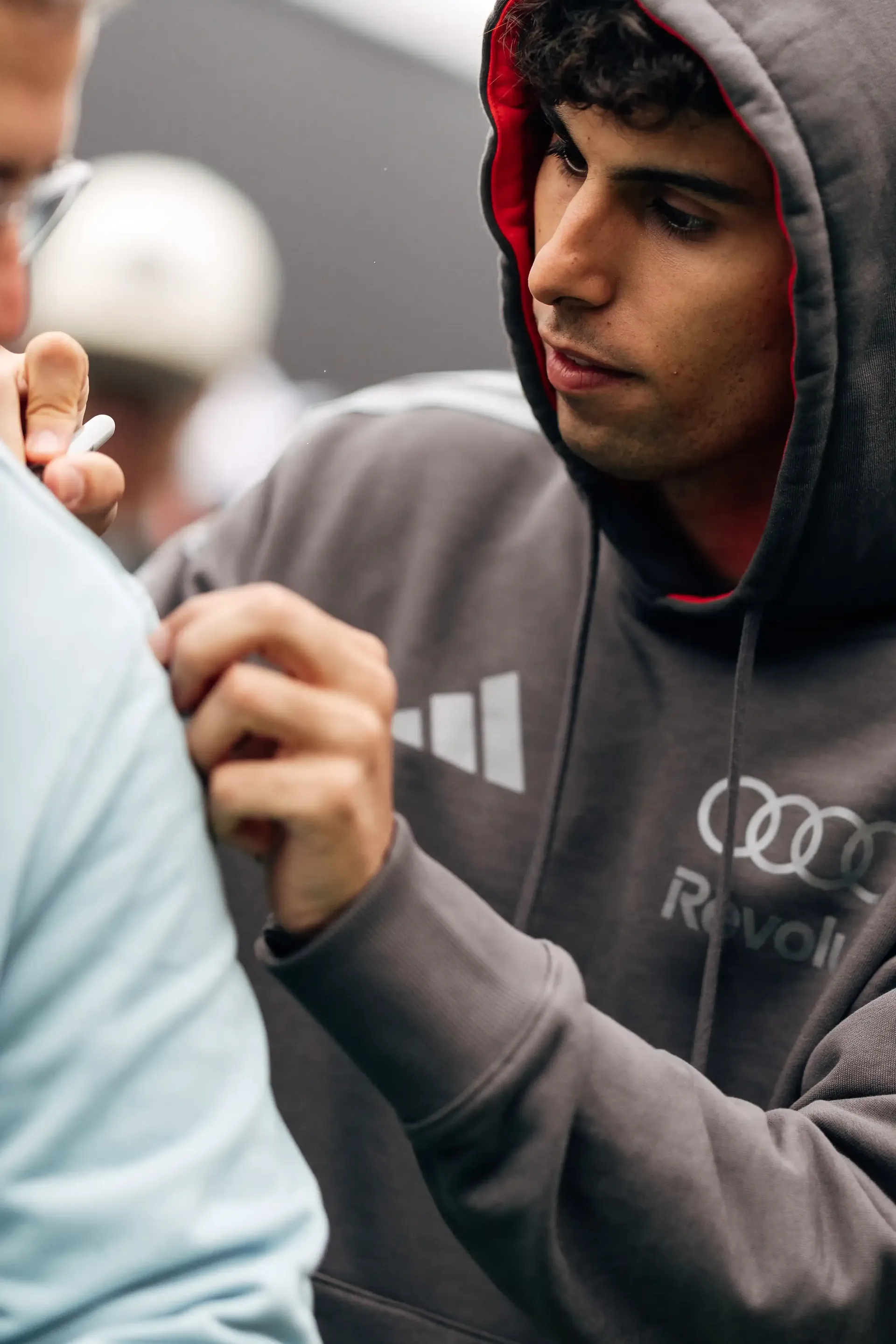 Gabriel Bortoleto driver at the Audi Revolut F1® Team signing autographs at the Canada Grand Prix 2026 on racing day