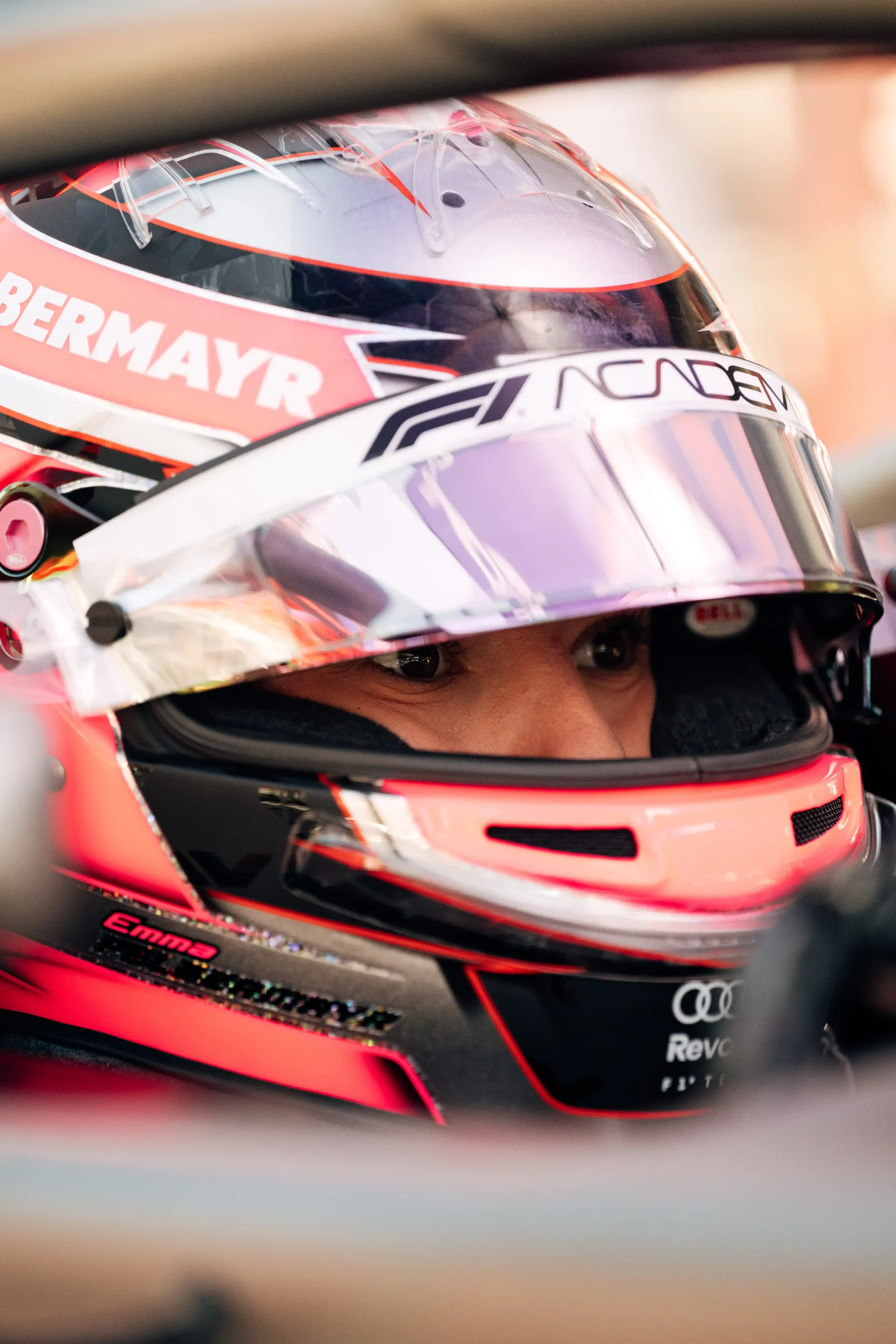 Close-up of Emma Felbermayr wearing her helmet inside the Audi Revolut F1® Team cockpit during the Chinese Grand Prix weekend.