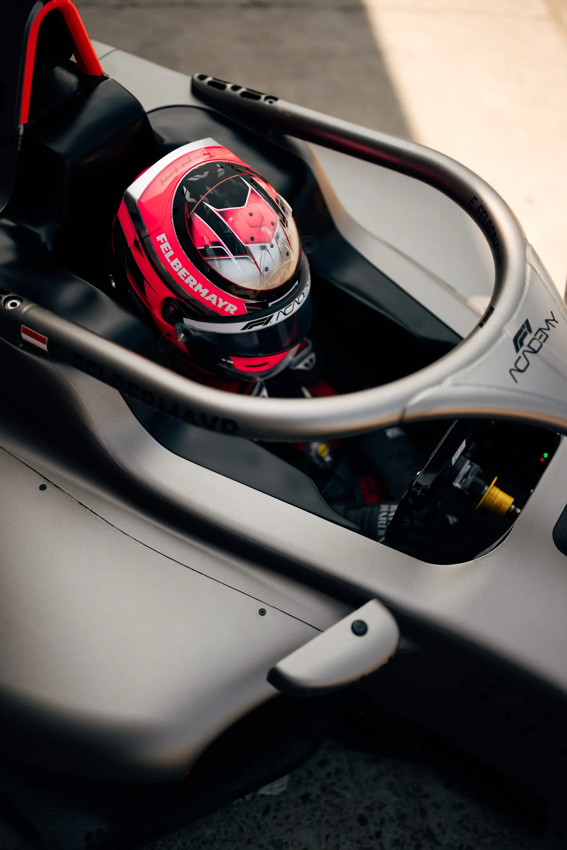 Detail view of the Audi Revolut F1® Team Formula 1 cockpit with Emma Felbermayr, Audi Revolut F1® Team Academy driver, inside.