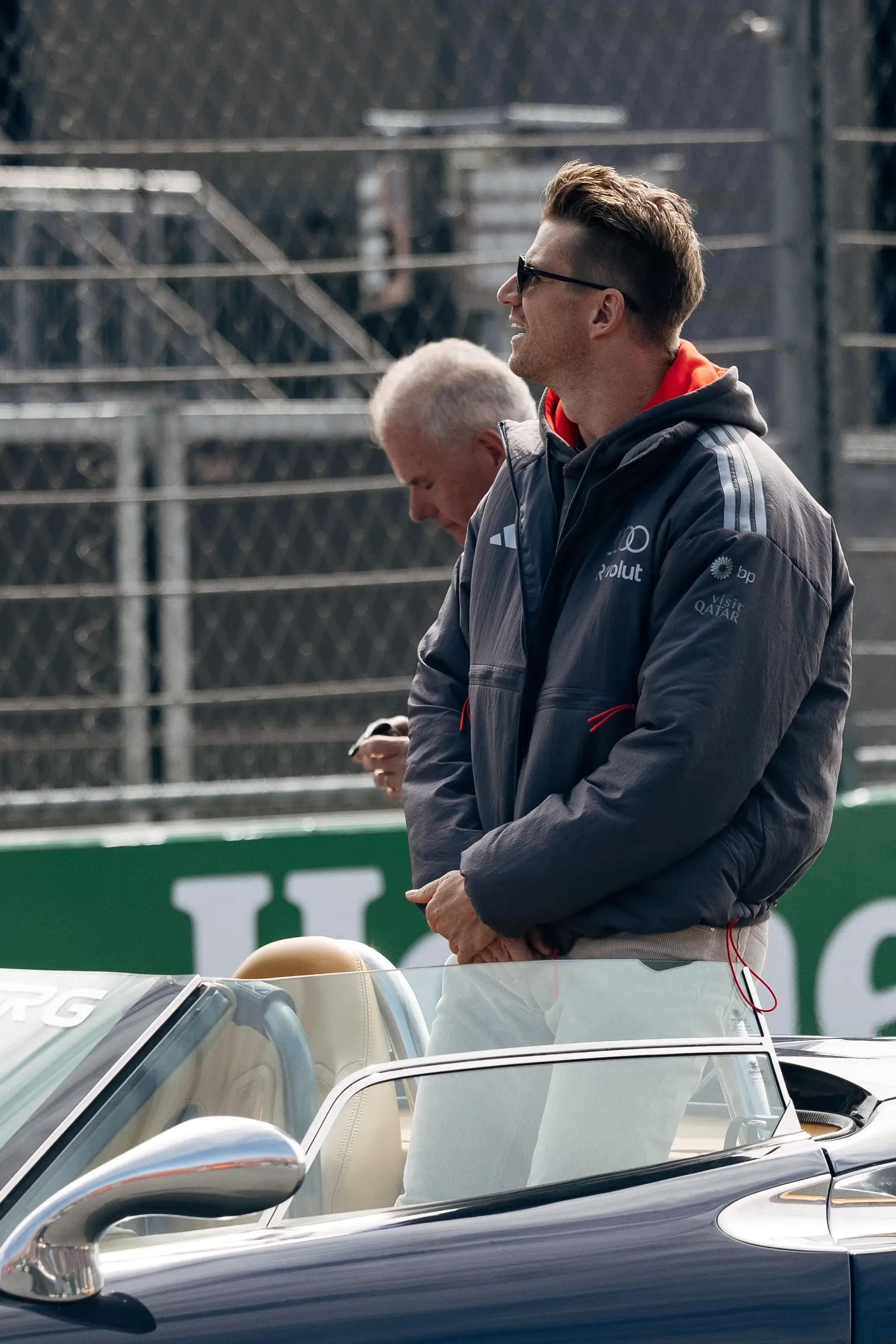 Nico Hulkenberg standing in an Audi Revolut F1® Team parade car during the Dutch Grand Prix.