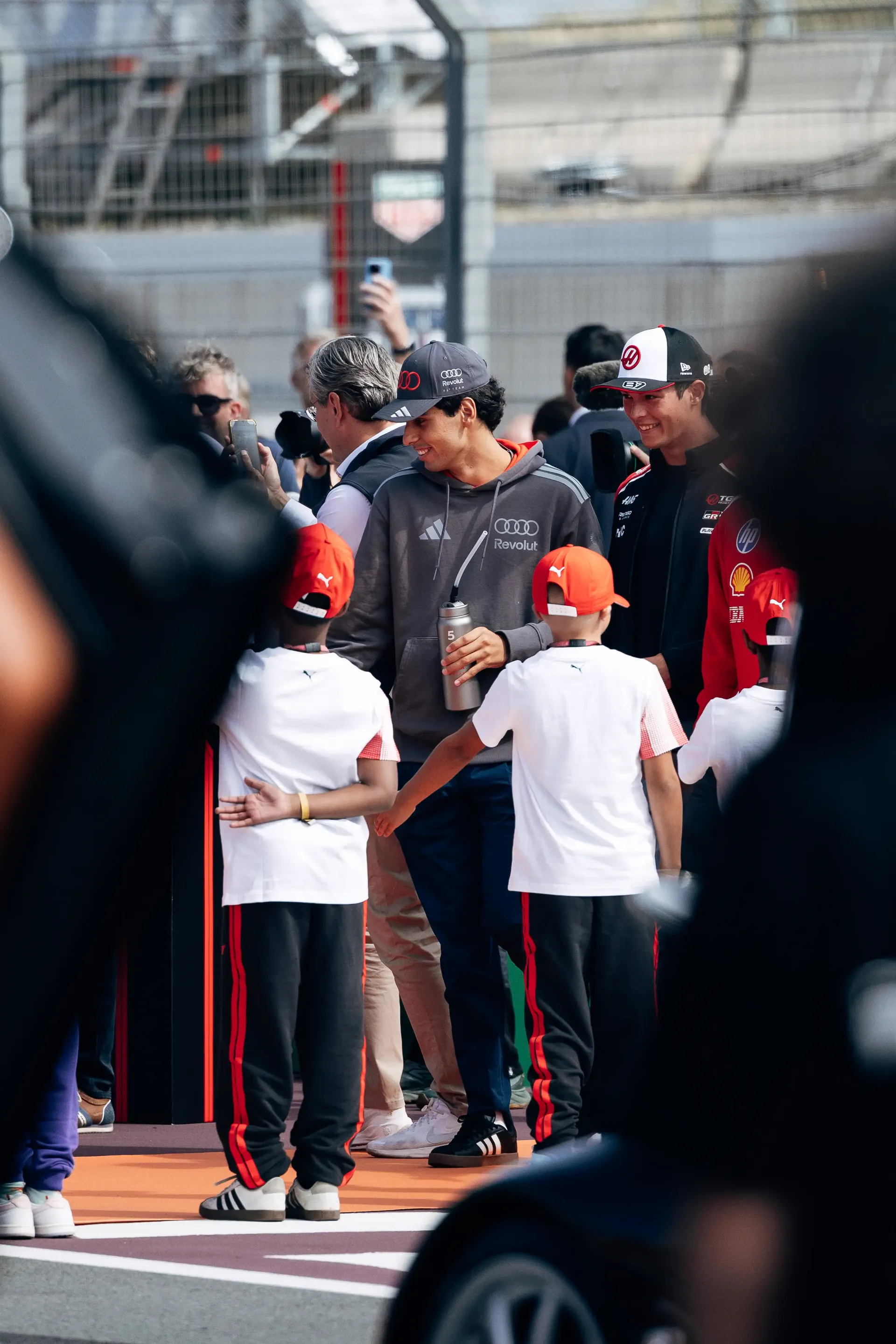 Nico Hulkenberg and Gabriel Bortoleto greeting fans during the Audi Revolut F1® Team Dutch Grand Prix fan parade.