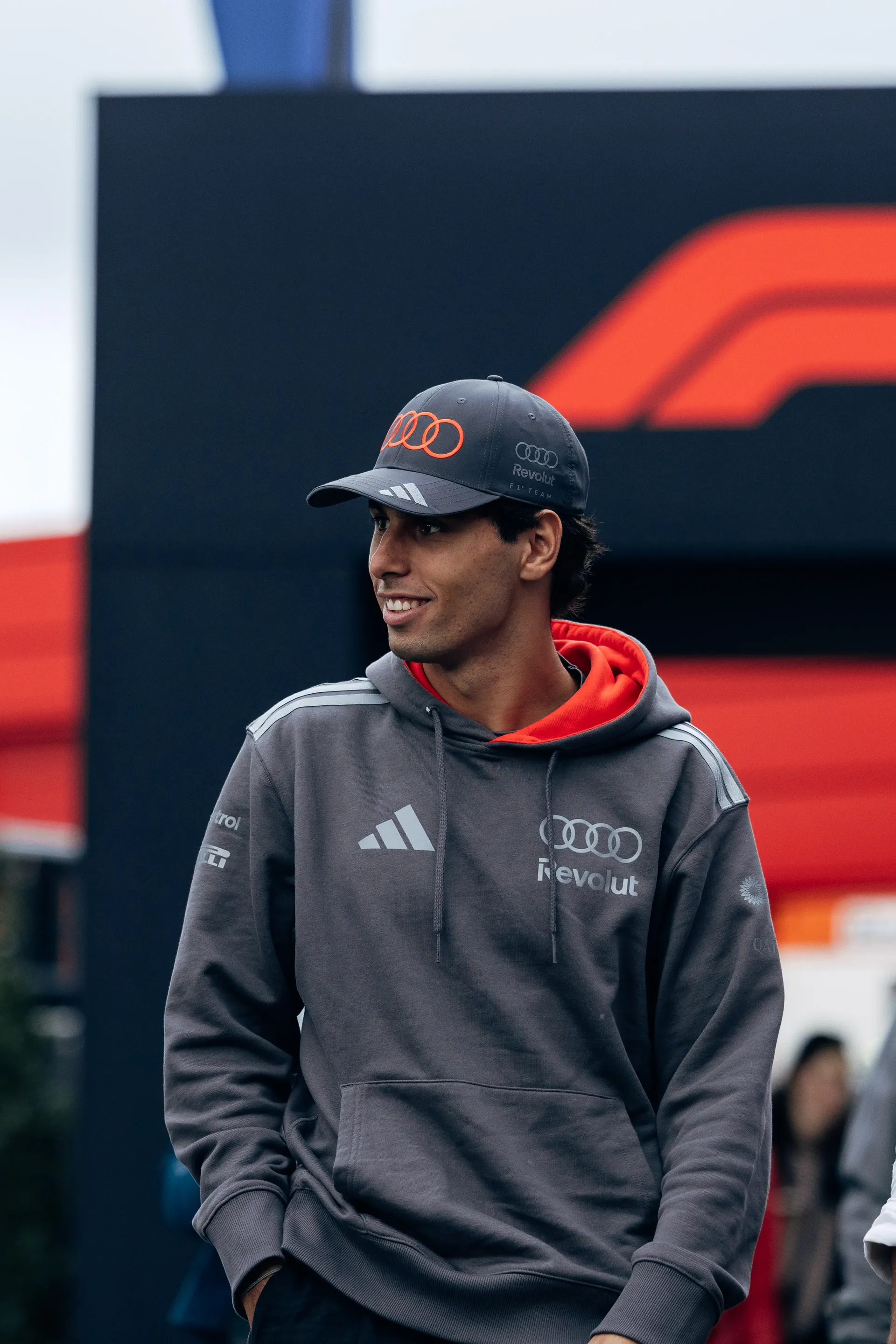 Audi Revolut F1® Team driver Gabriel Bortoleto walking through the Dutch Grand Prix paddock.