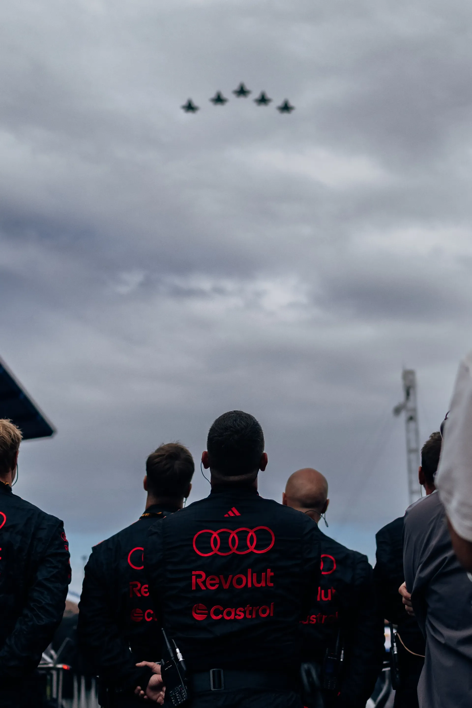 Audi Revolut F1® Team mechanics watch aircraft fly over the circuit ahead of the Dutch Grand Prix.
