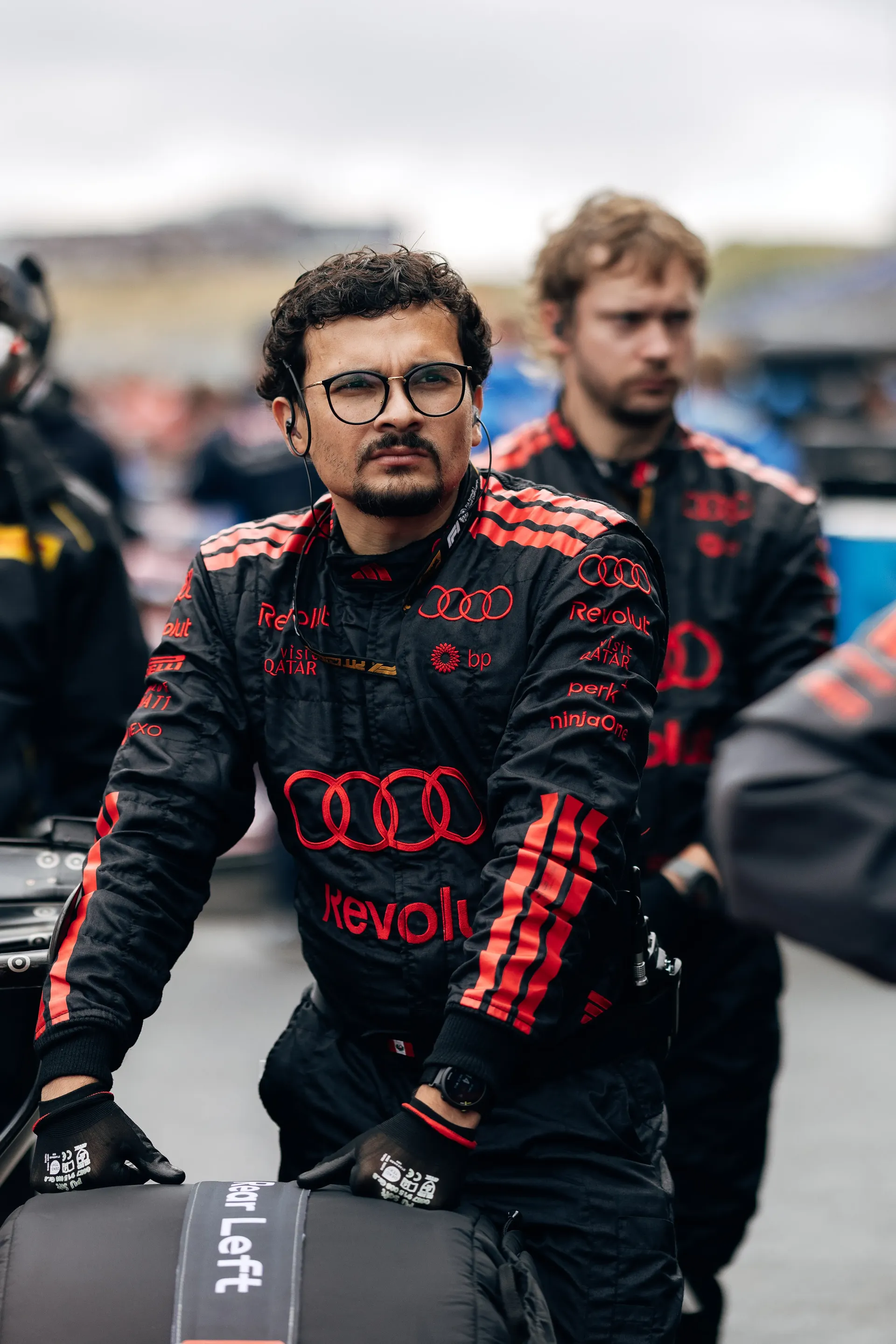 Audi Revolut F1® Team mechanic walks through the paddock ahead of the Dutch Grand Prix.