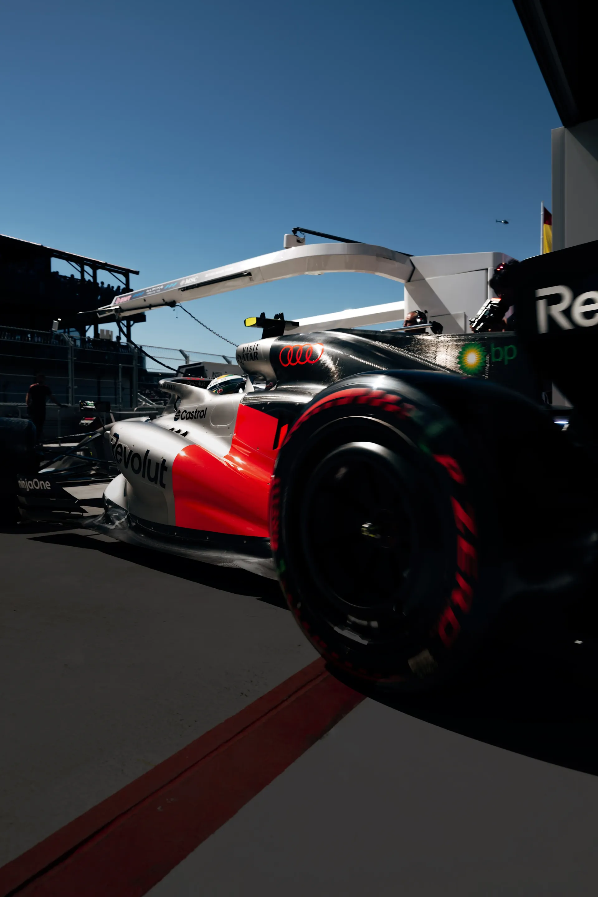 Side view of the Audi Revolut F1® Team car Audi R26 leaving the garage at the Spanish GP 2026