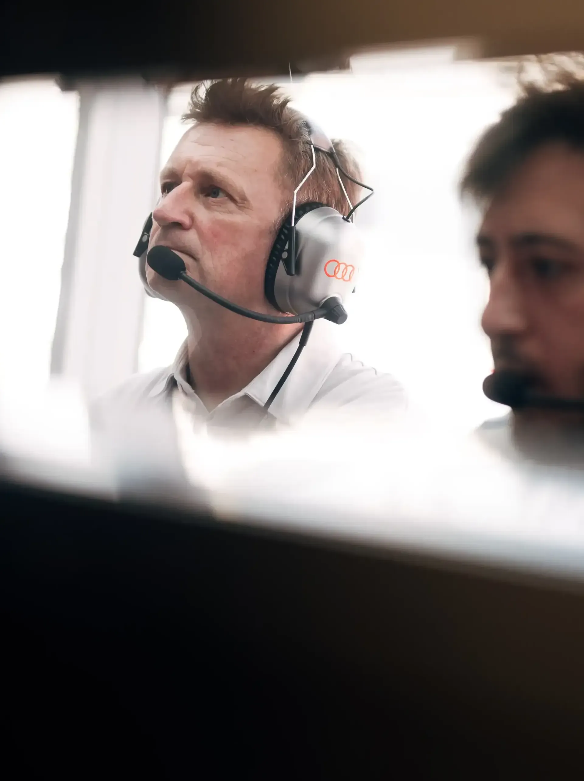 Close Up of Allan McNish racing director at Audi Revolut F1® Team inside the booth at the British Grand Prix 2026