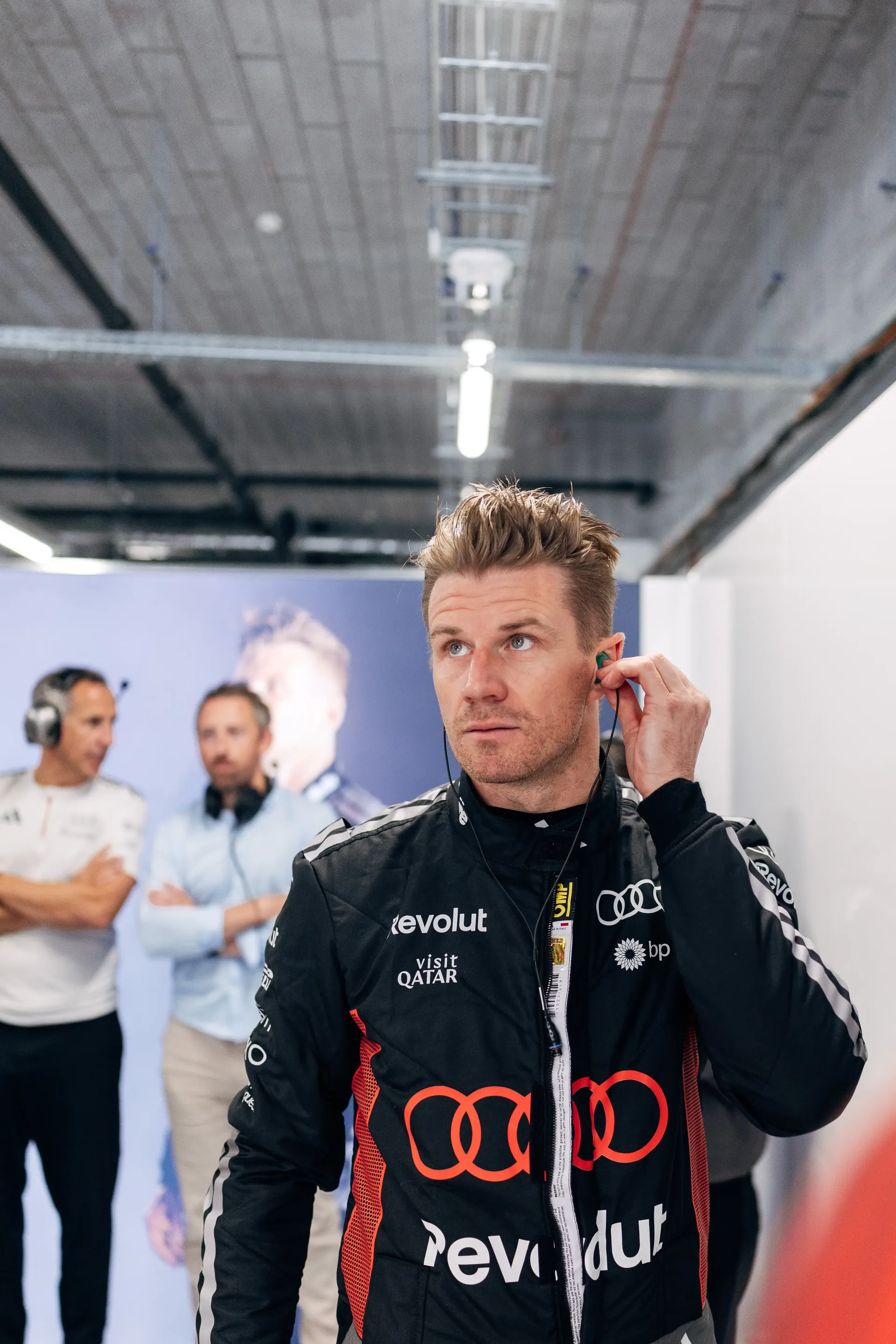 Audi Revolut F1® Team driver Nico Hulkenberg walks through the paddock before FP3 at the Hungaroring.