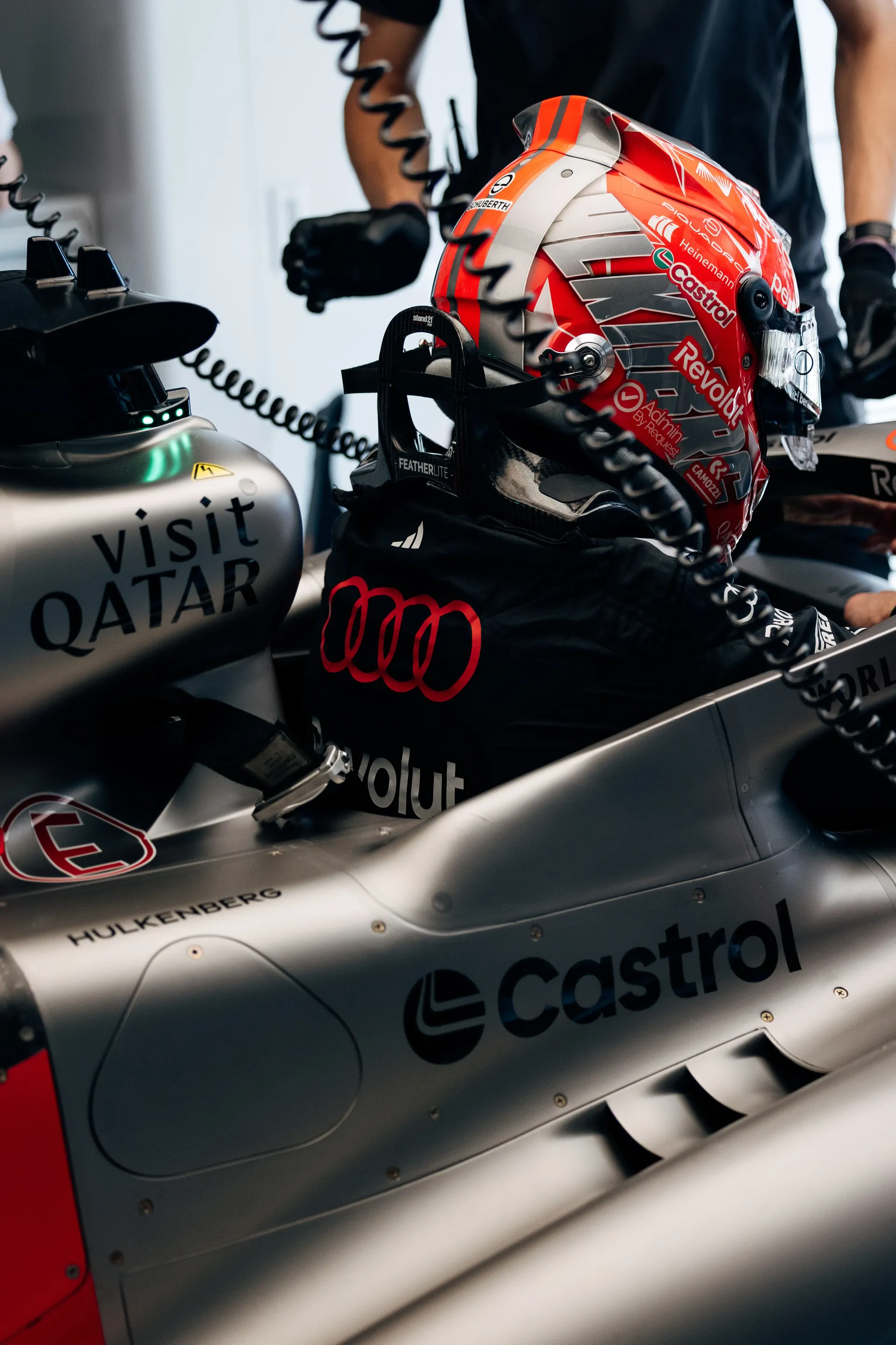 Nico Hulkenberg driver at the Audi Revolut F1® Team sits in the Audi R26 inside the garage ahead of a Friday practice run.