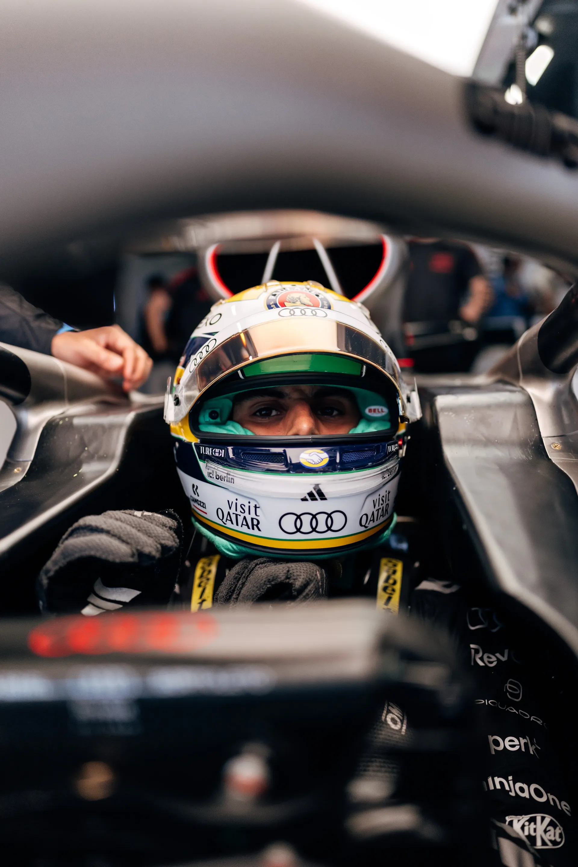 Front view of Audi Revolut F1® Team driver Gabriel Bortoleto seated in the cockpit of the Audi Revolut F1® Team car Audi R26 inside the team garage before returning to the track.