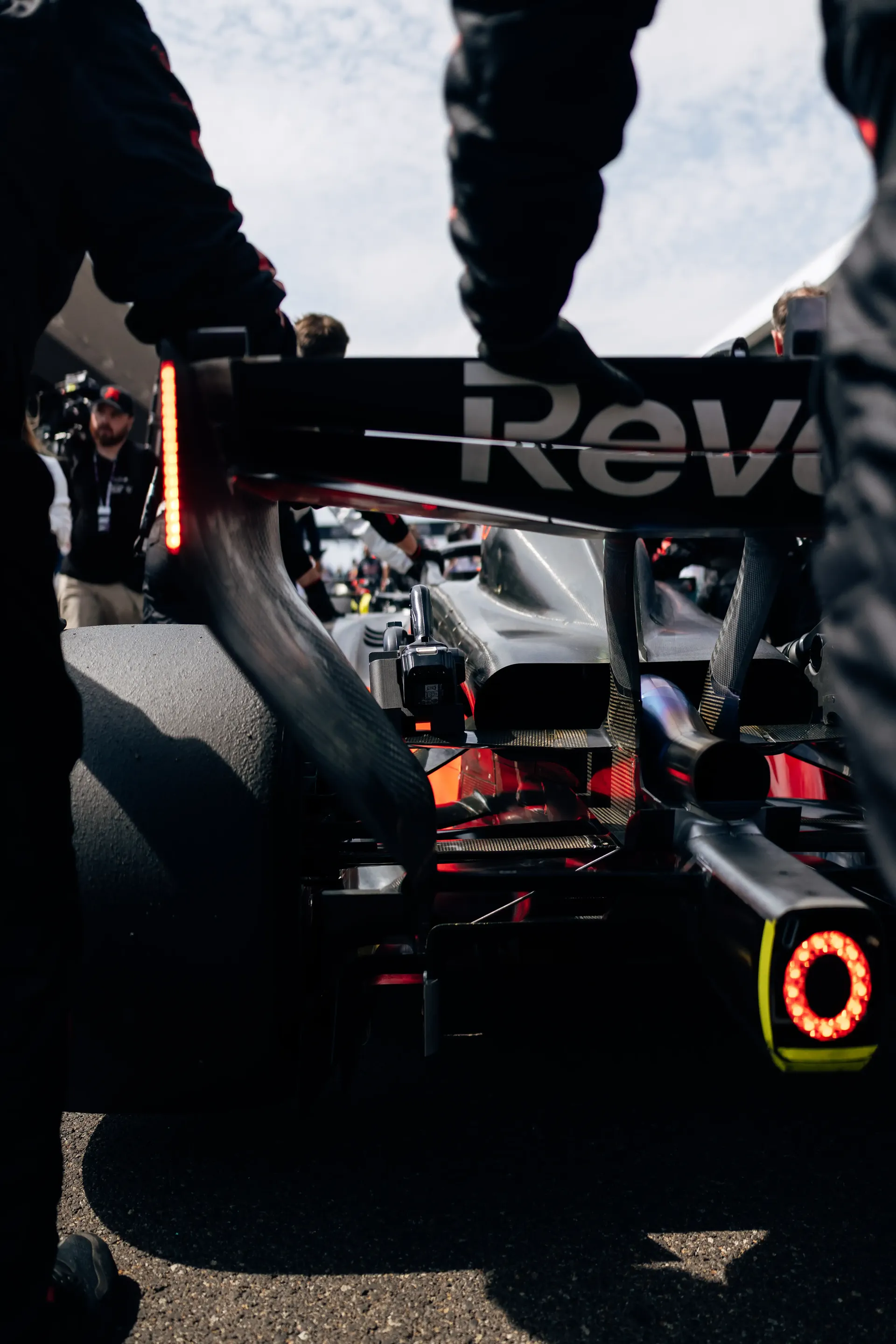 Rear view of the Audi Revolut F1® Team Audi R26 as mechanics make final adjustments on the Hungaroring grid.